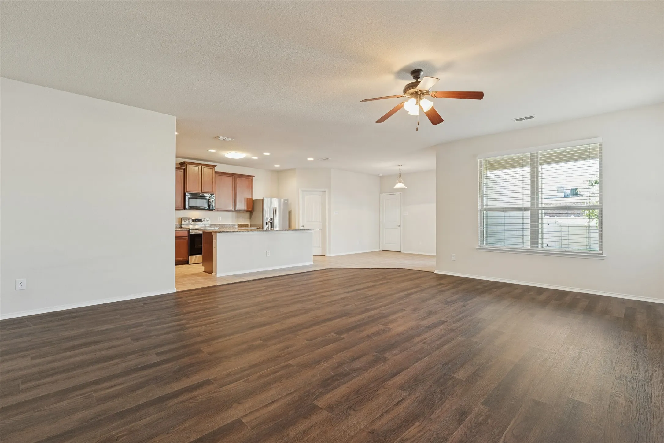 Wood-finish flooring throughout the main living area