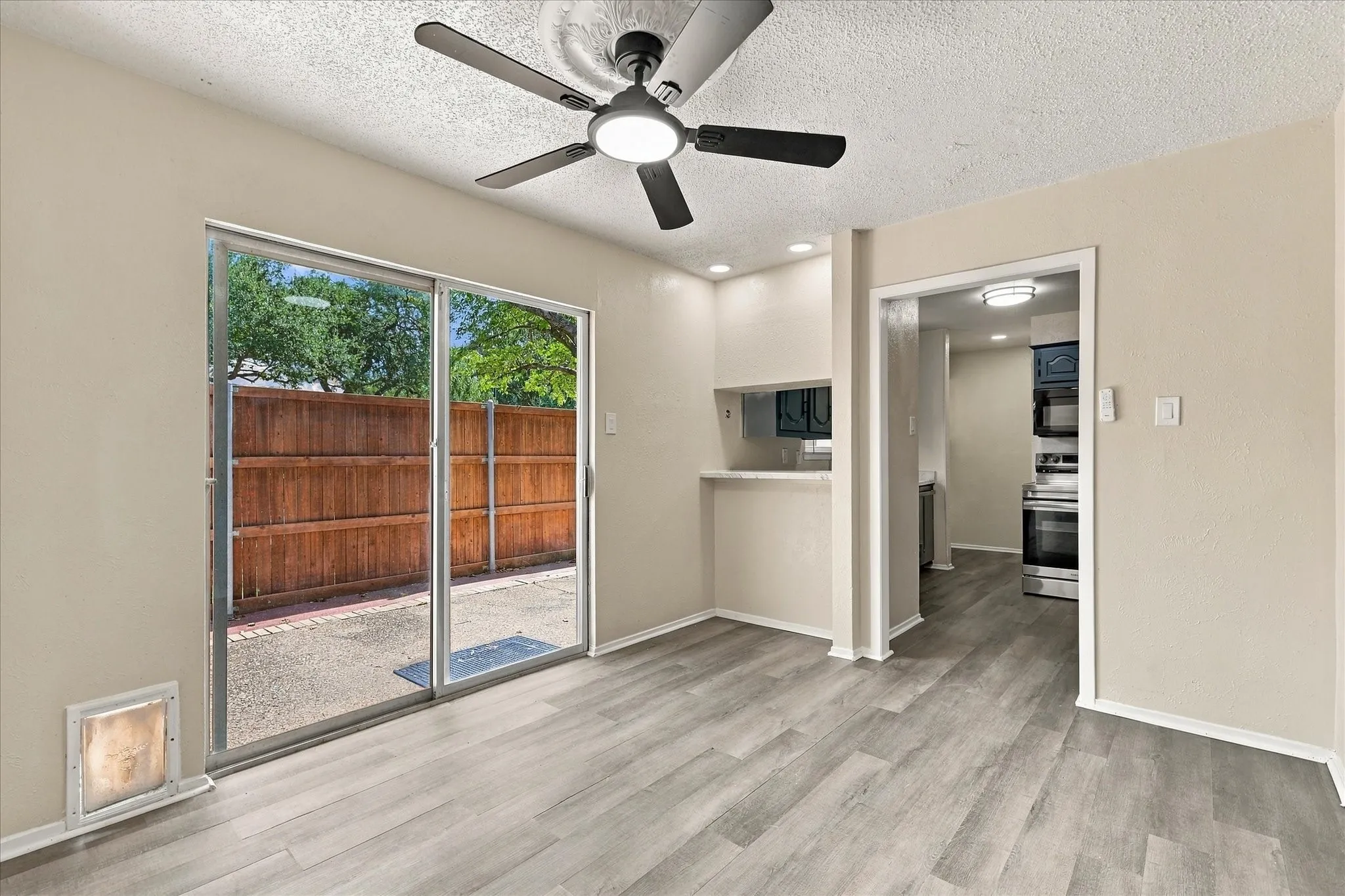 Wood-finish flooring with a ceiling fan