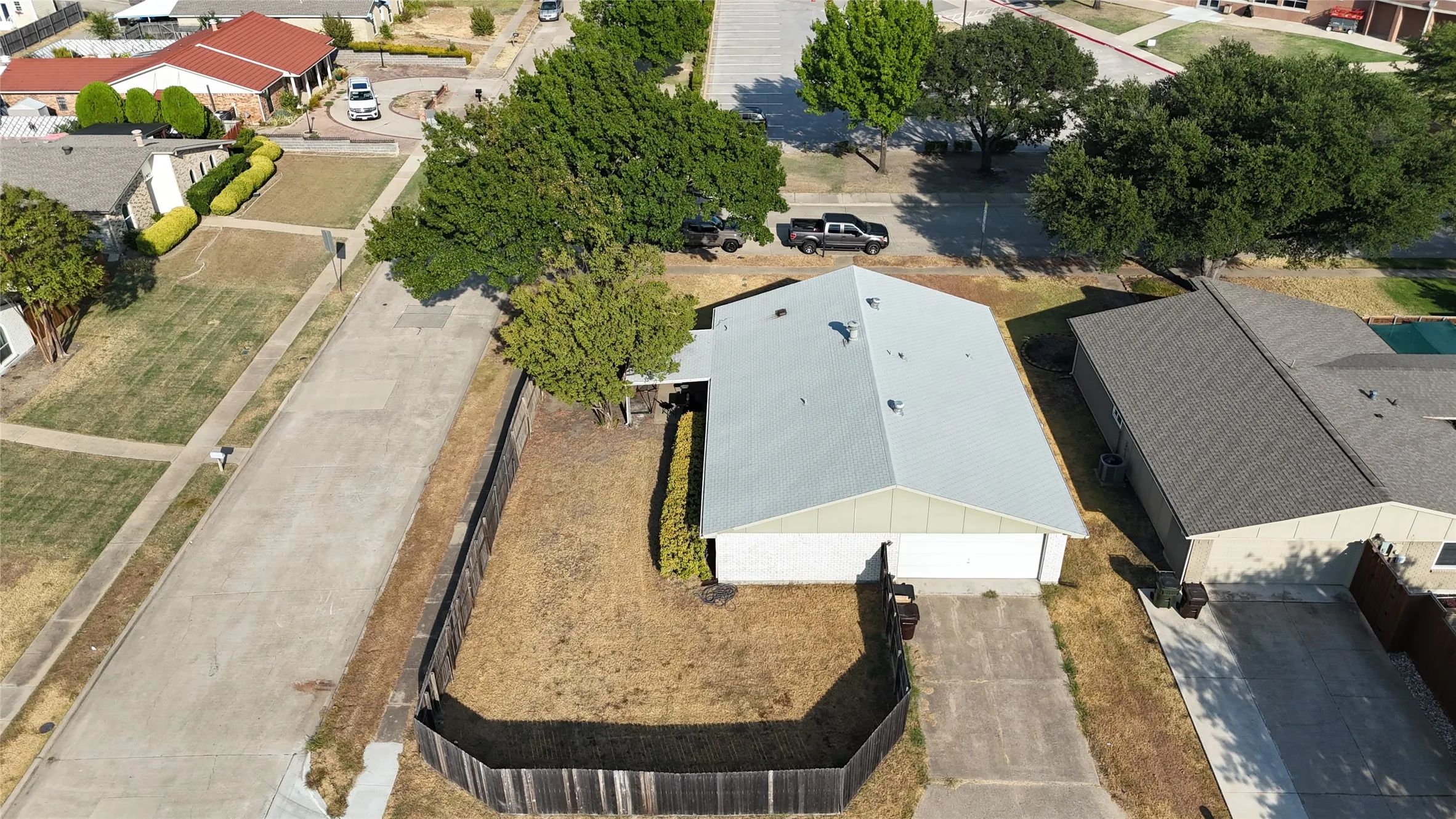 Single-story residence with a light-colored gable roof