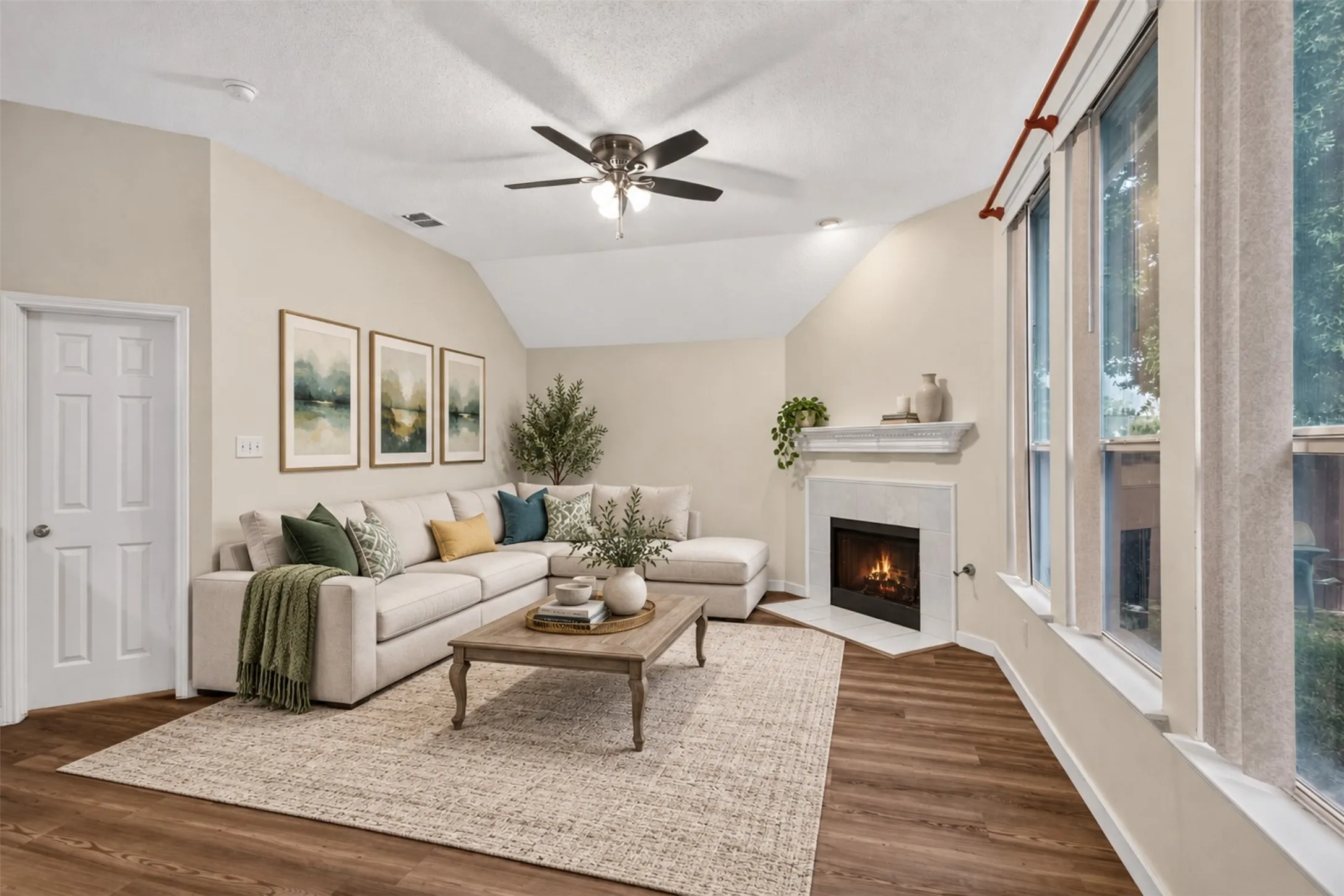 Bright living room with a wall of windows!