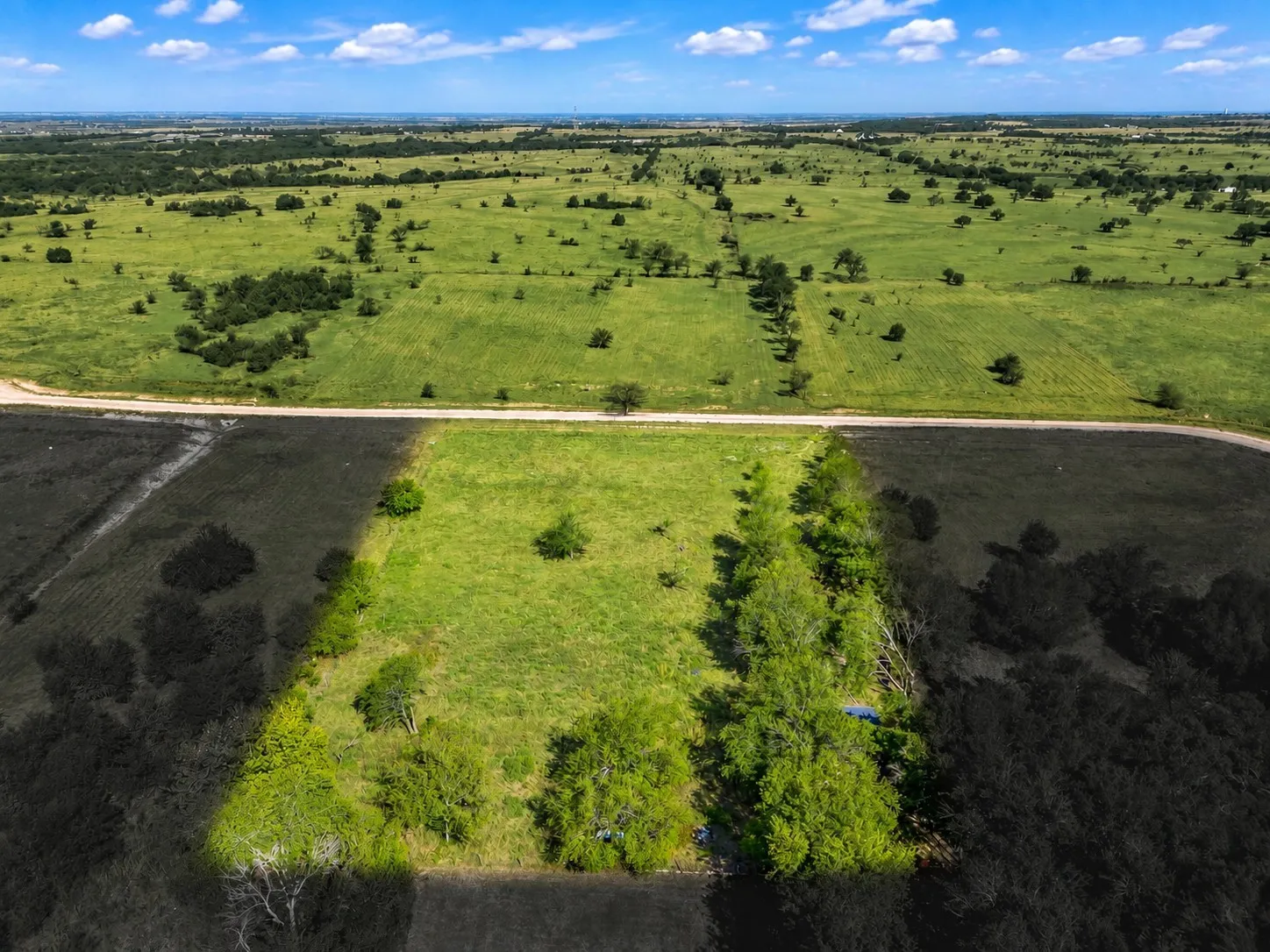 2-acre lot with mature trees!