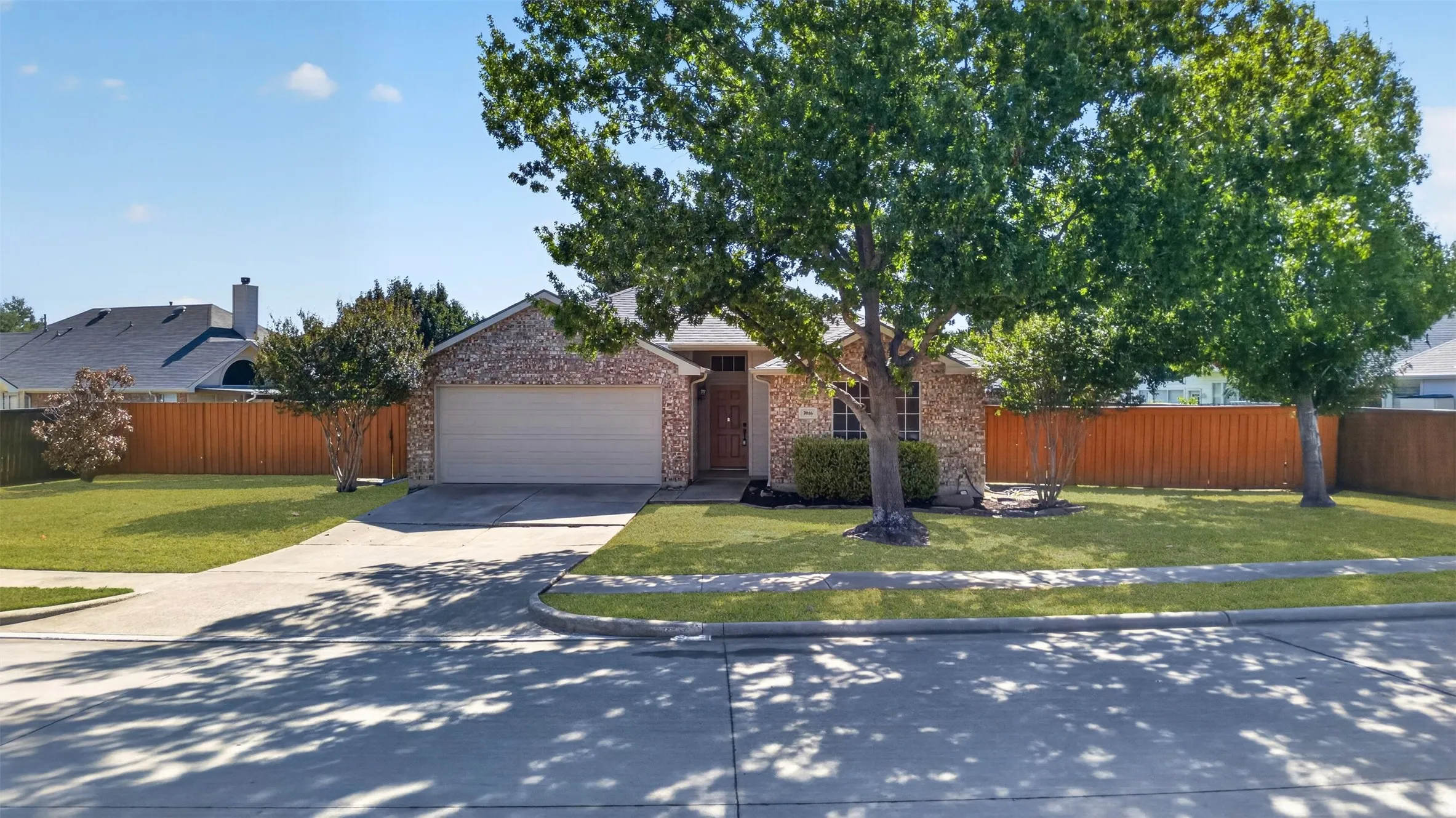 Large treed front yard!