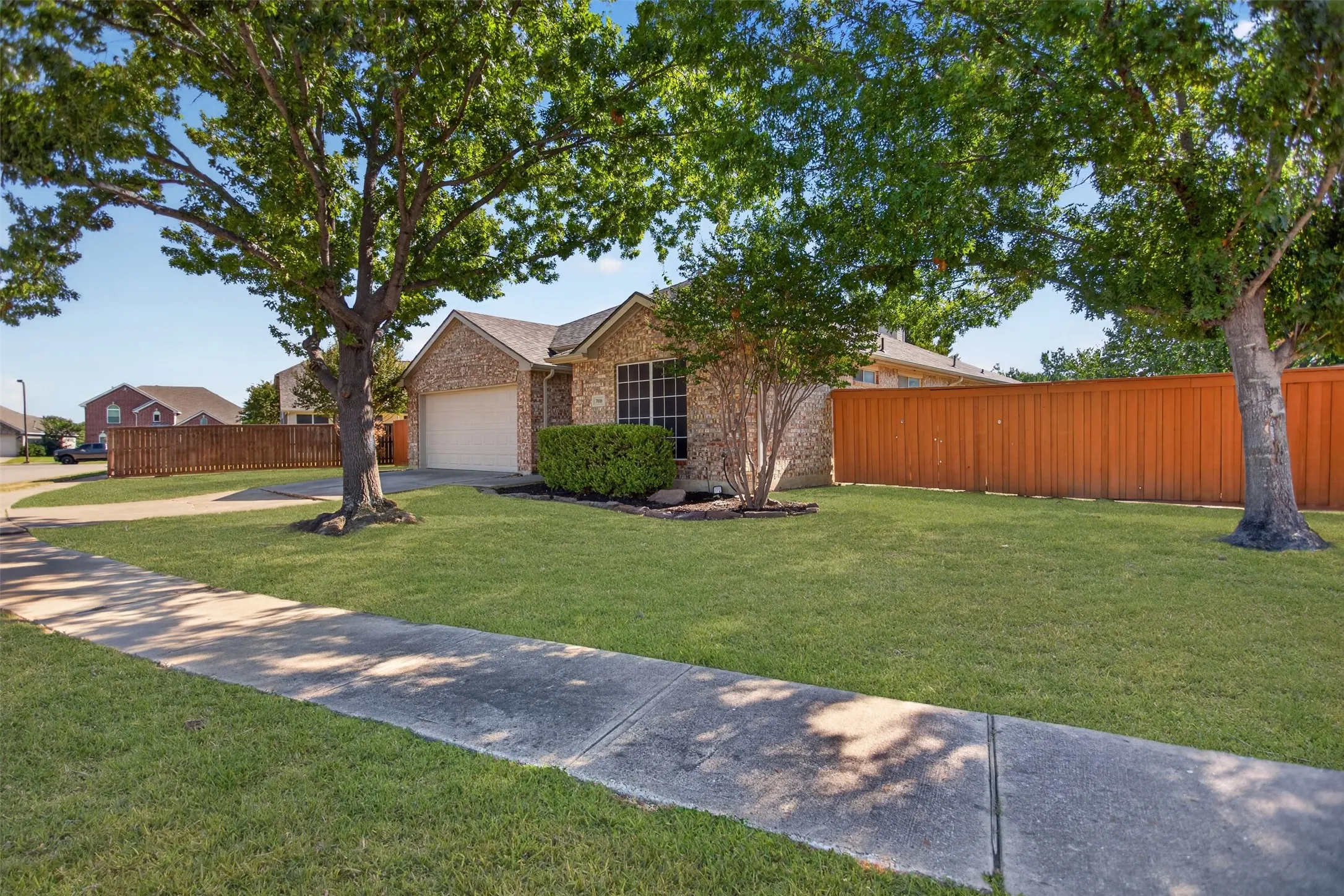 Amazing shaded front with mature trees