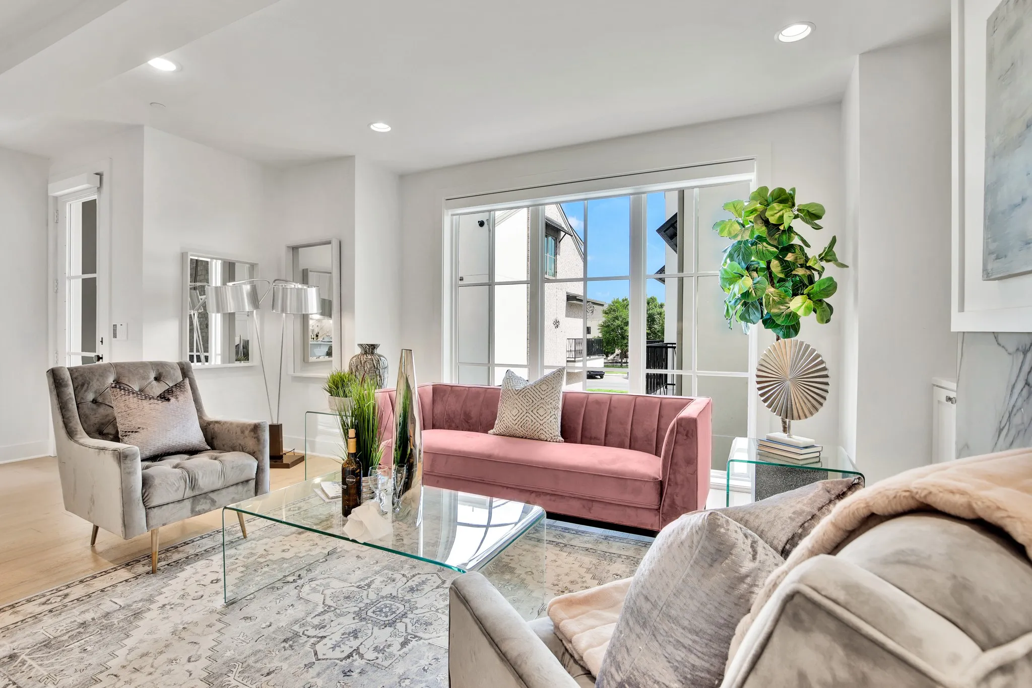 Living room with recessed lighting and wood finished floors