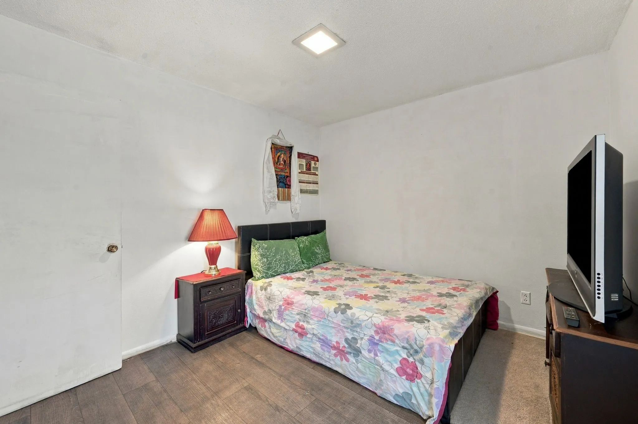 Another view of one of the 2 secondary bedrooms downstairs with ample natural light.