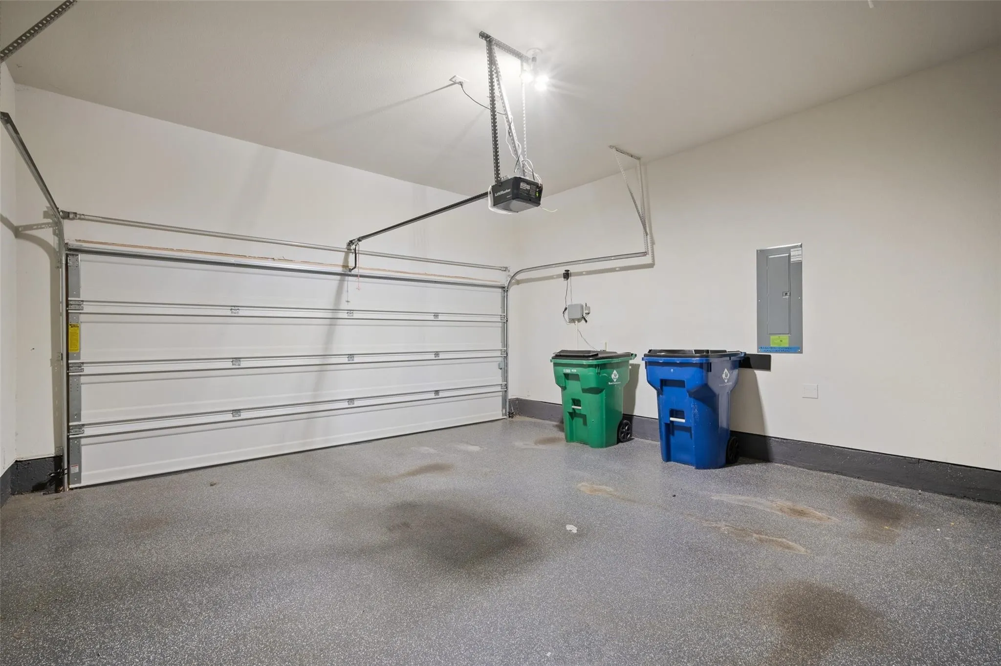Overhead garage door with automated opener