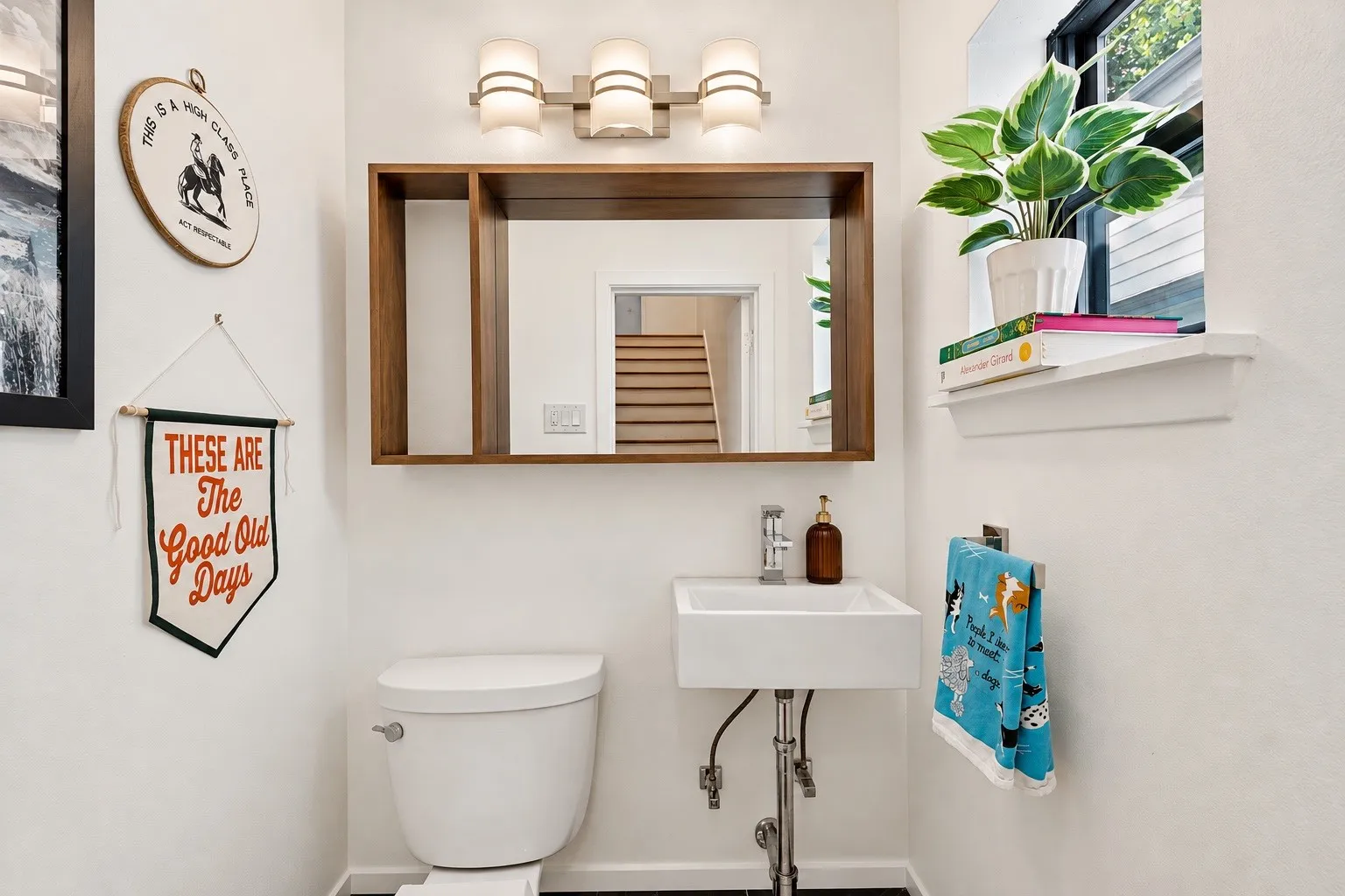 White walls with a black tile floor