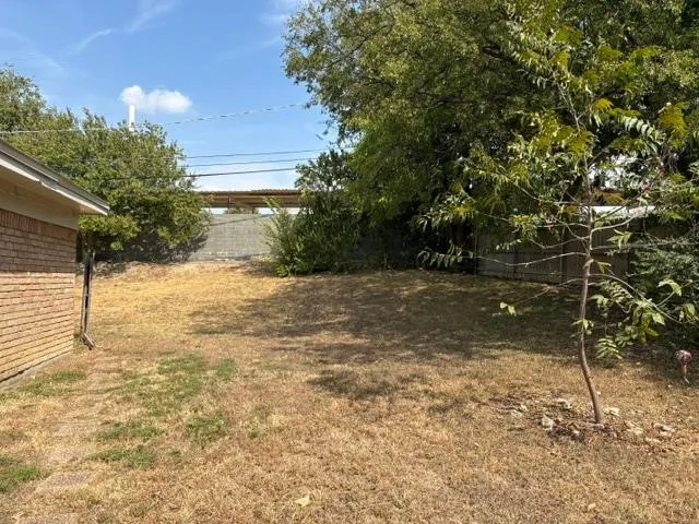 Large patio area with private backyard