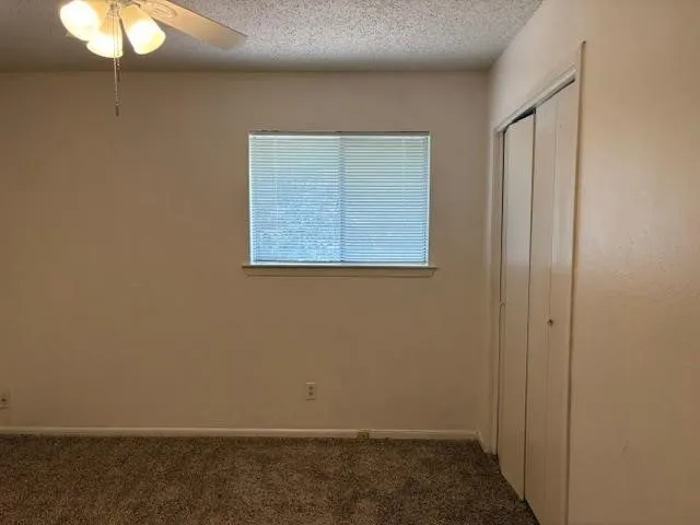 Bedroom  Neutral wall color and ceiling fan