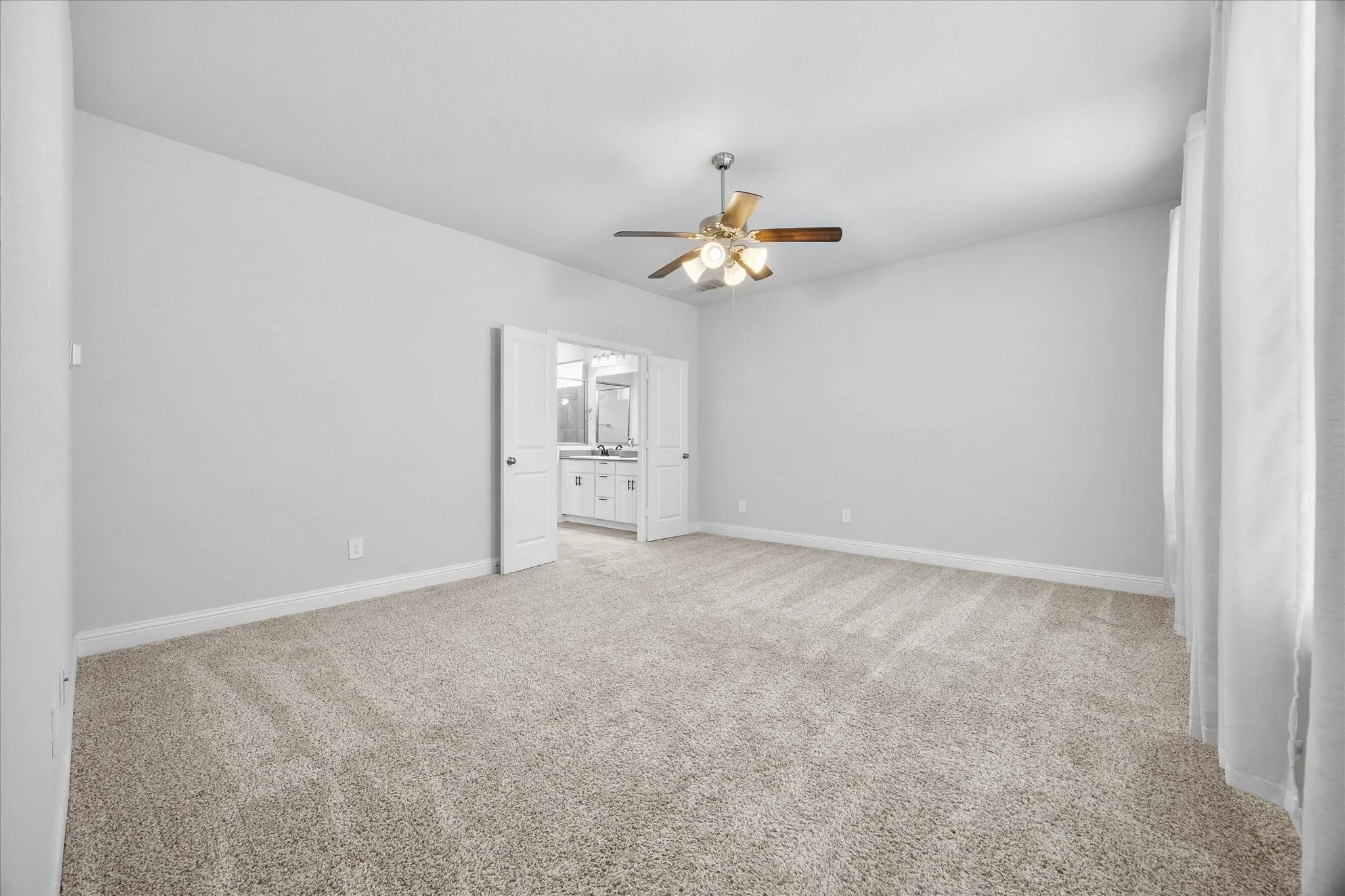 Gorgeous master bedroom opens onto spa style master bath