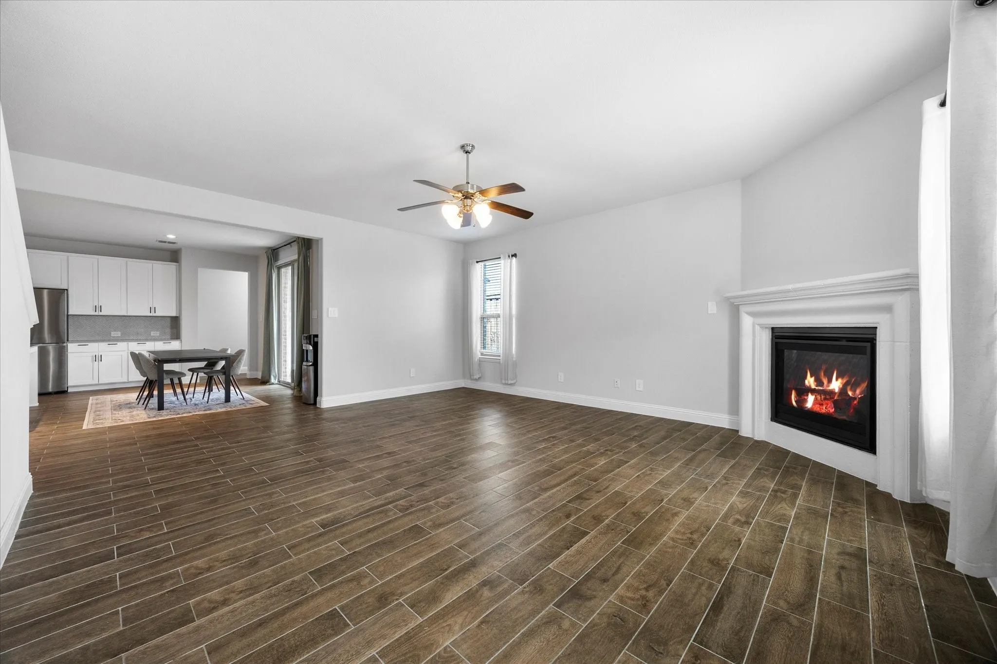 Family room opens onto dining area and kitchen