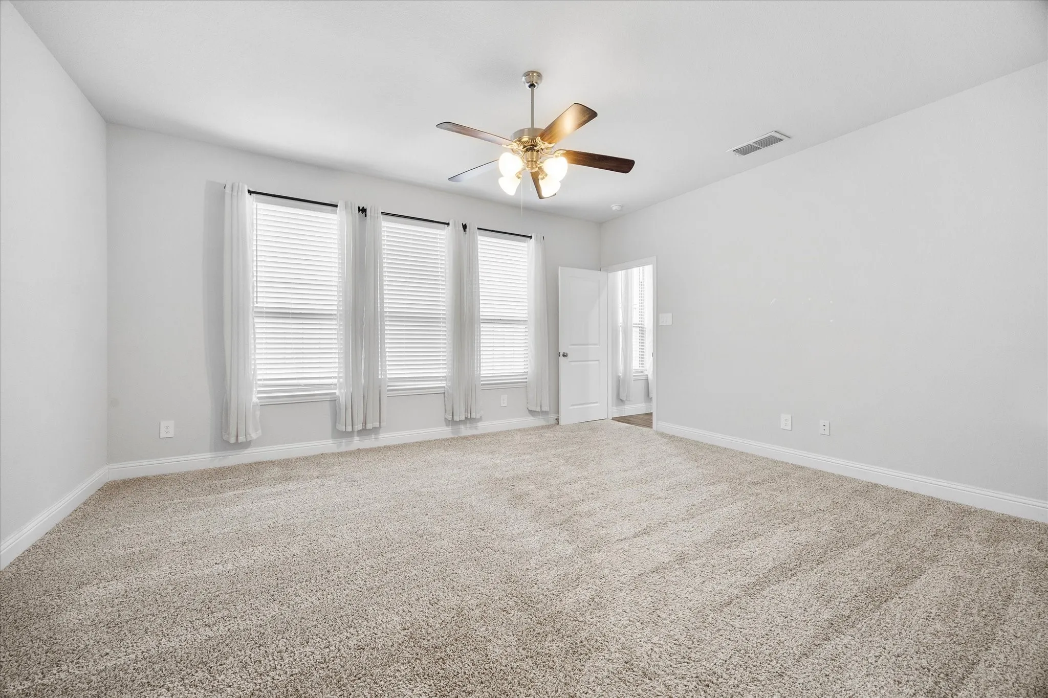 Lovely master bedroom opens onto master bath
