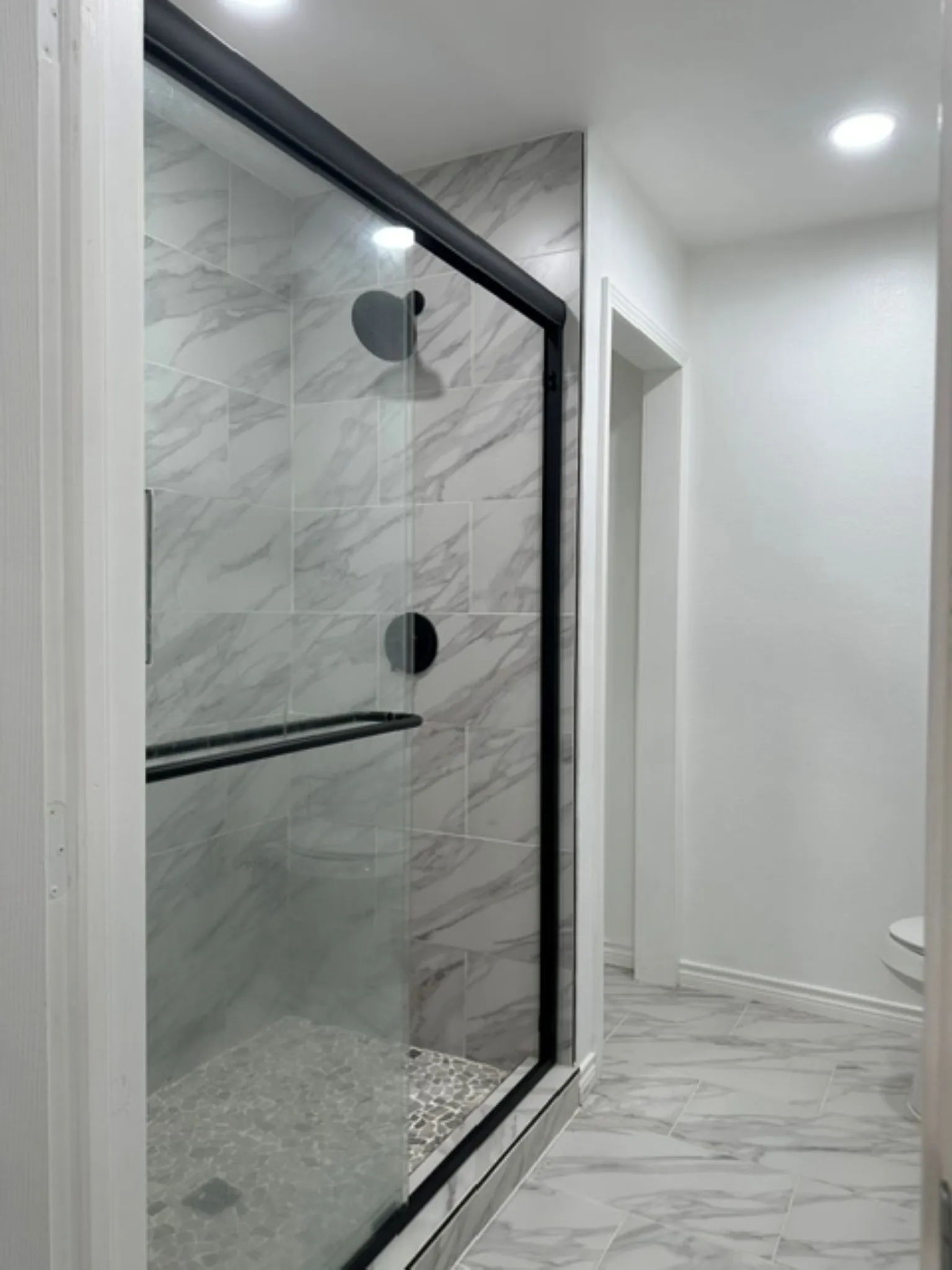 Walkin shower with closet and tile