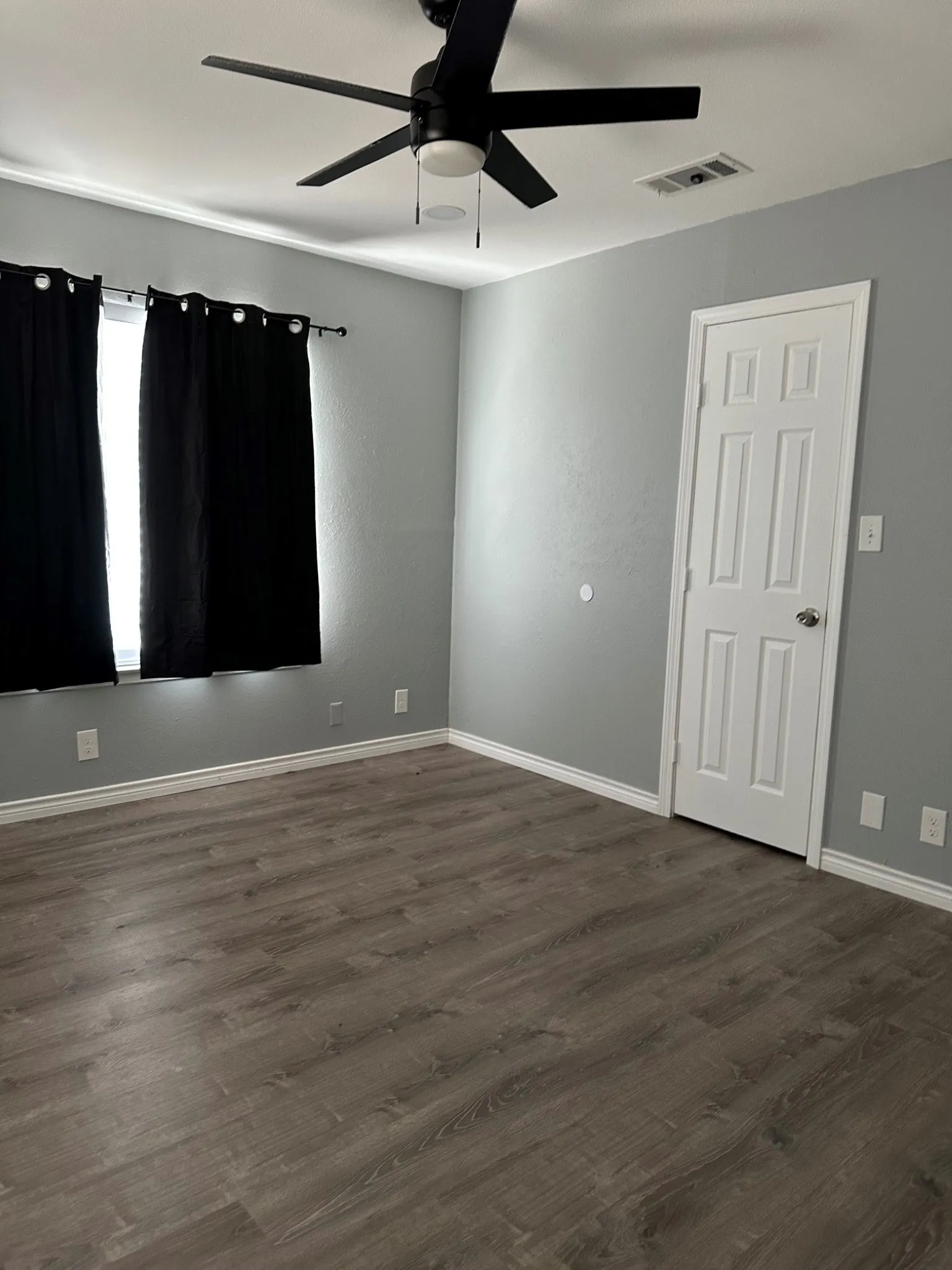 Front corner bedroom with closet