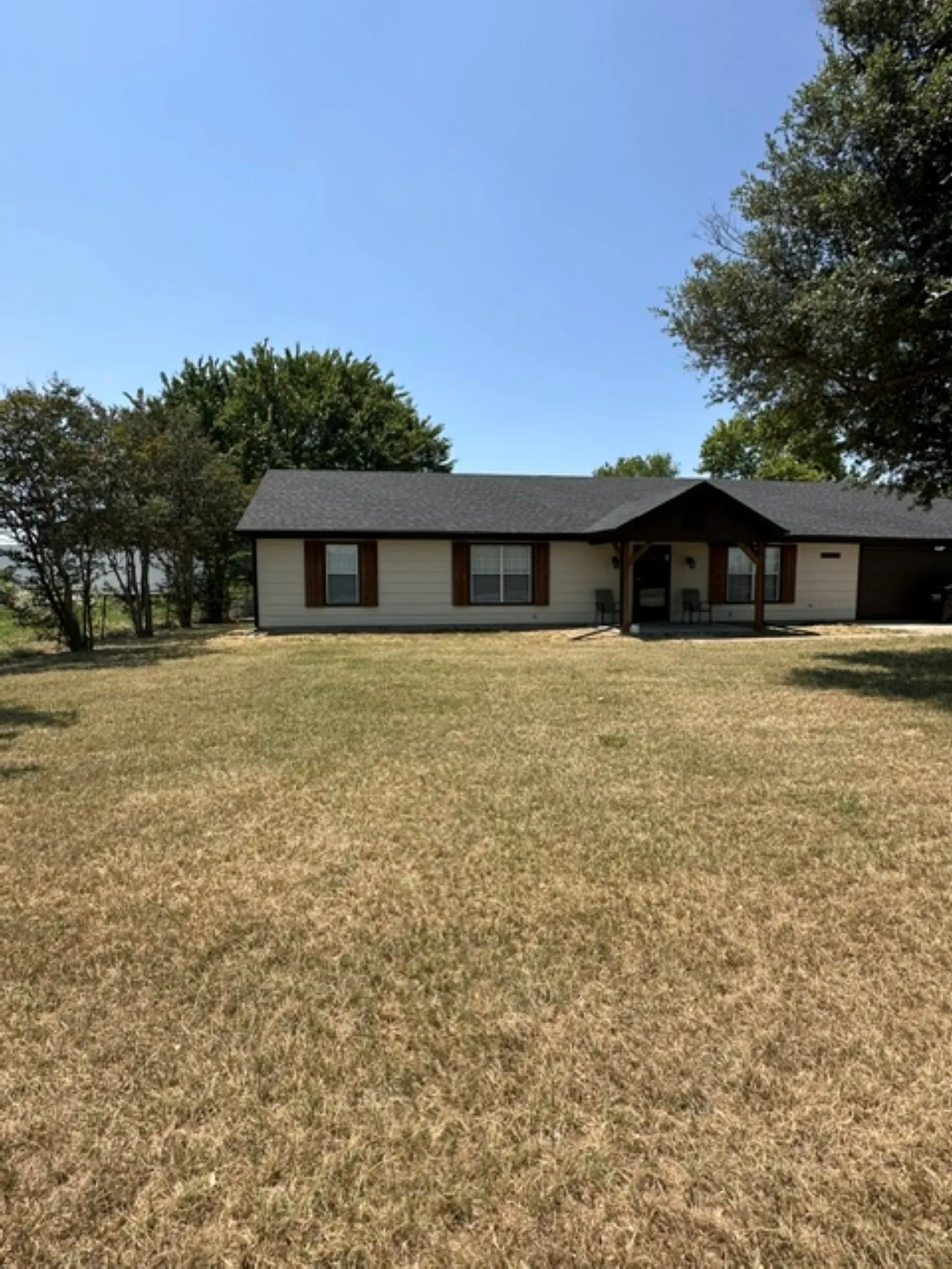 Front view looking at house from FM 1570