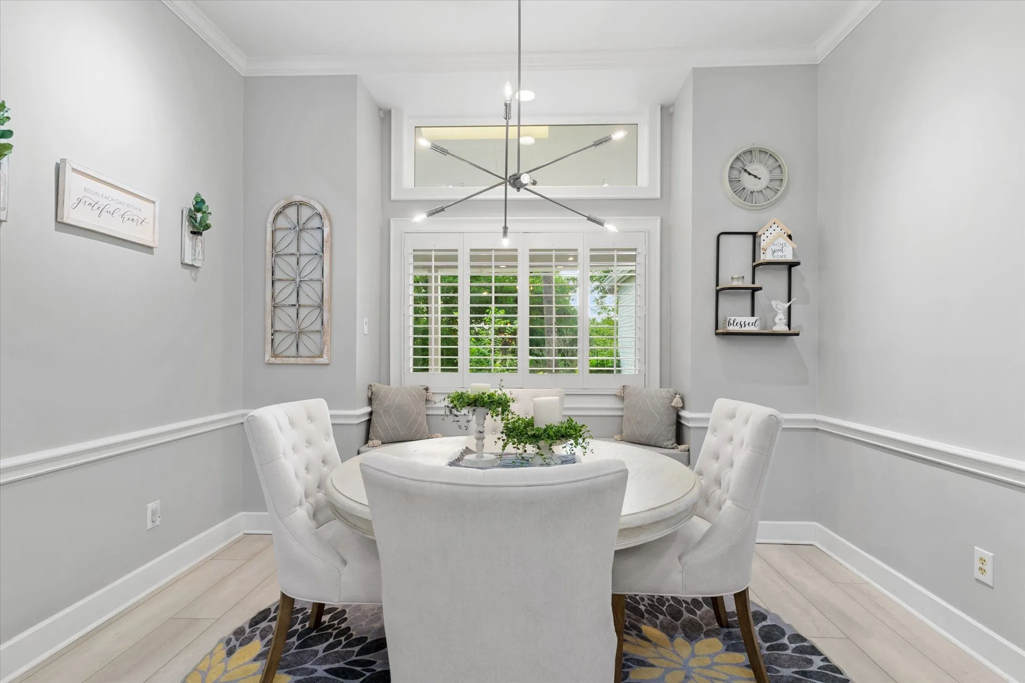 Recessed window with plantation shutters and a transom window