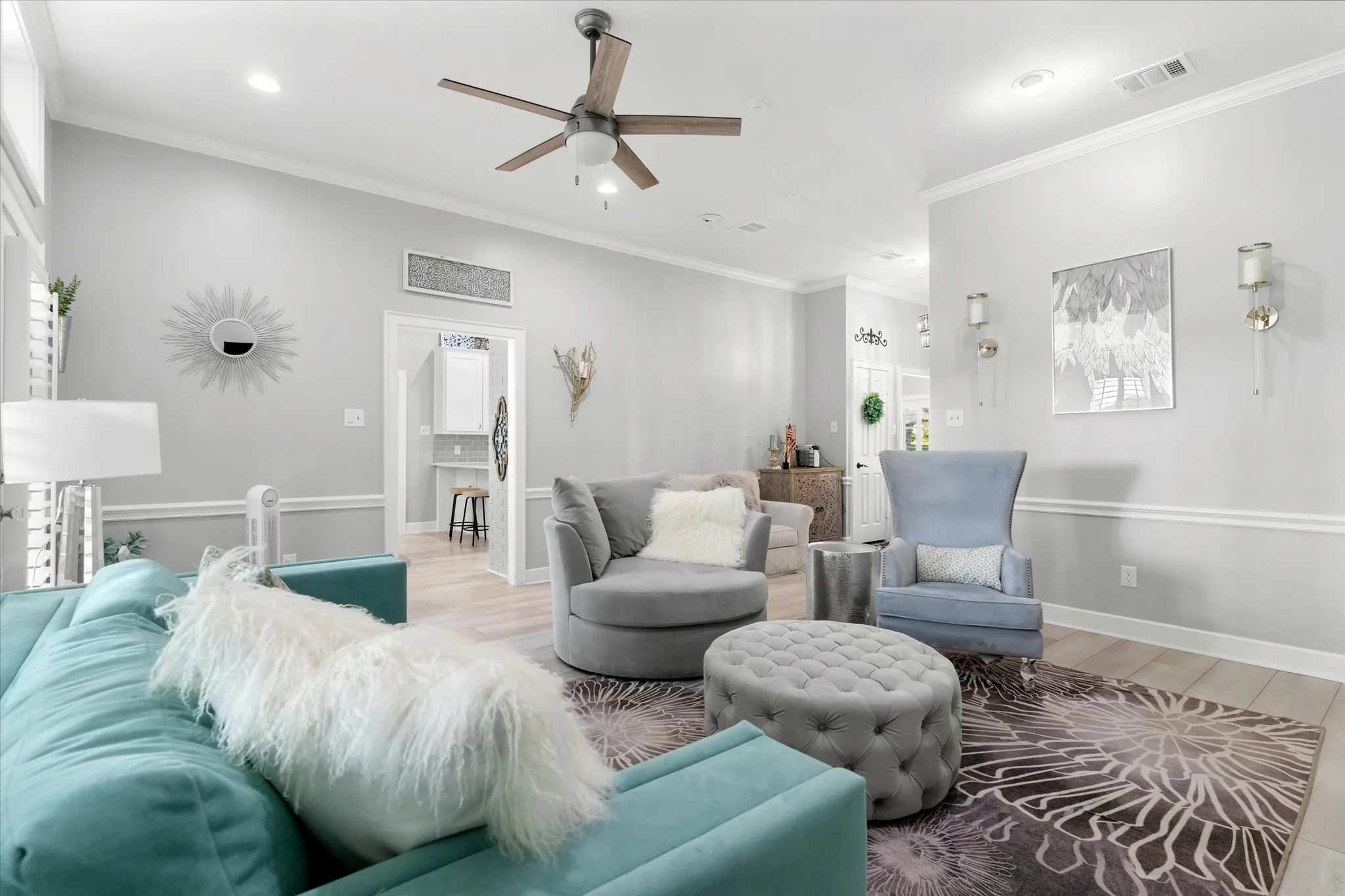 Vaulted ceilings featuring a ceiling fan with integrated lighting