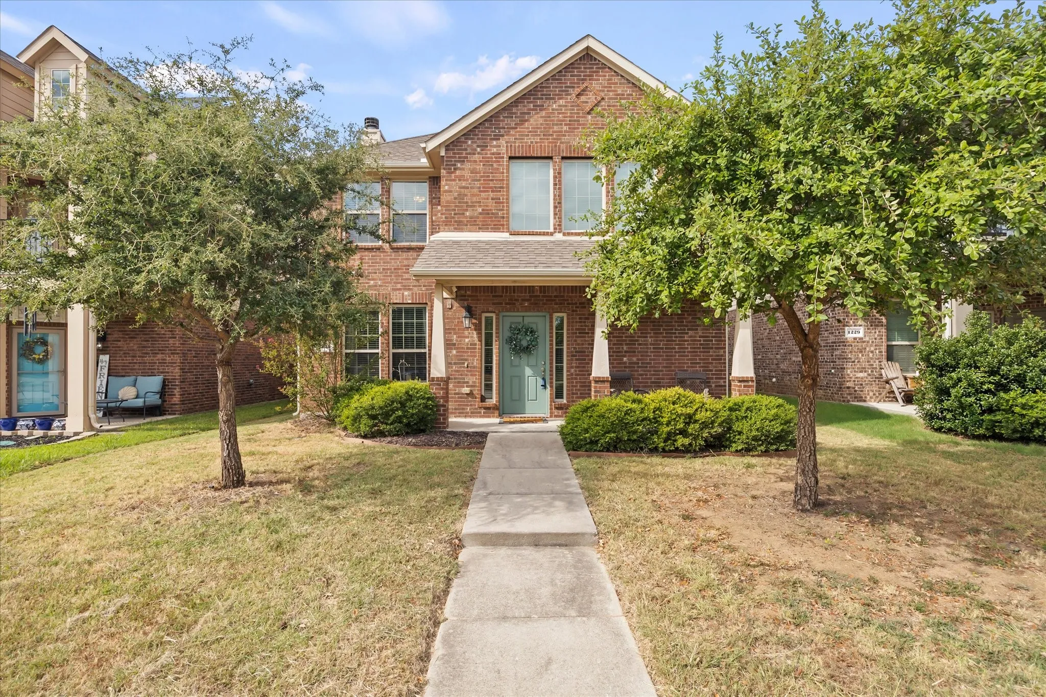 Brick exterior with a gabled​​‌​​​​‌​​‌‌​‌‌​​​‌‌​‌​‌​‌​​​‌​​ roofline