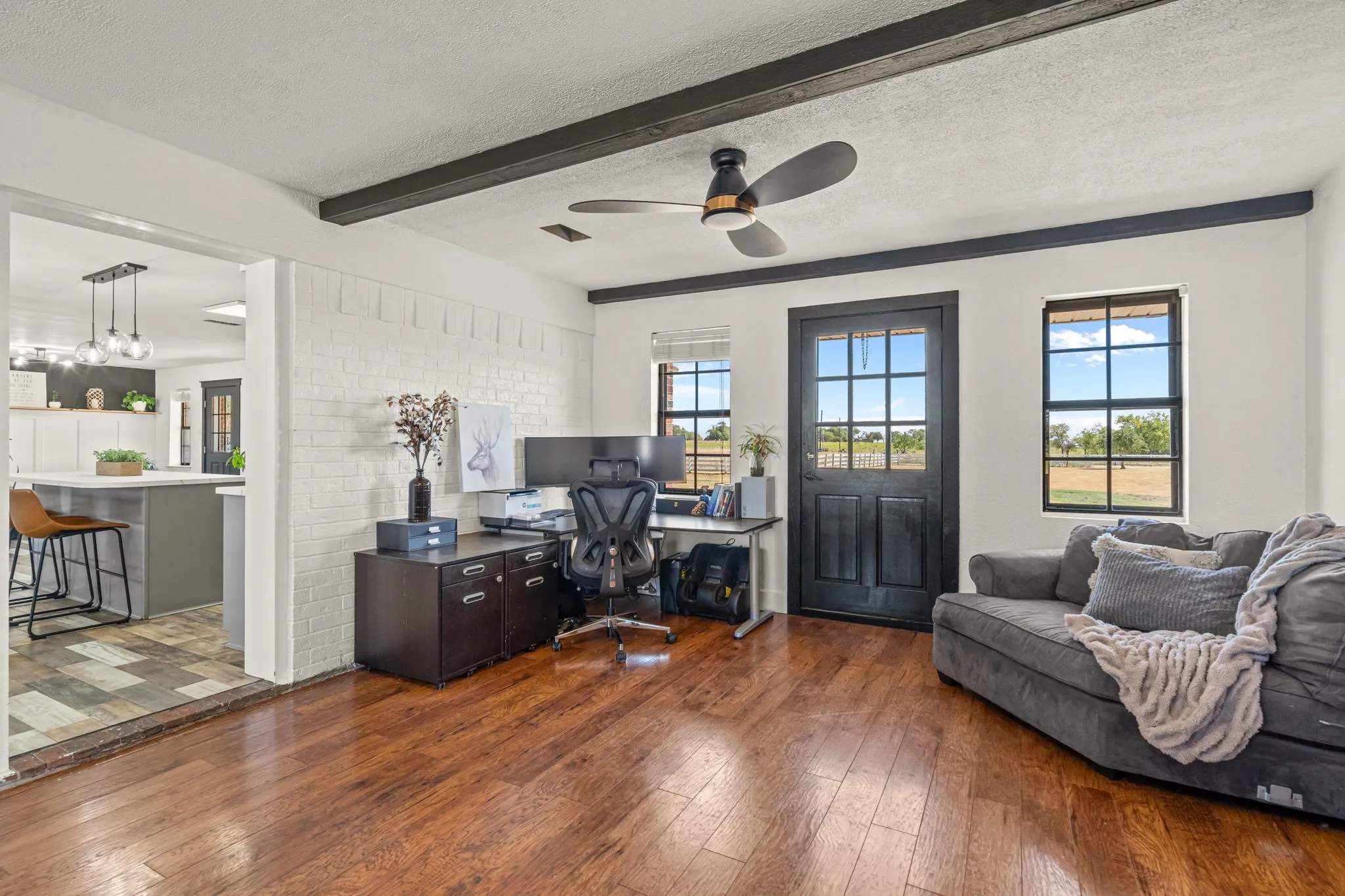 Extra bonus space between kitchen/dining and garage