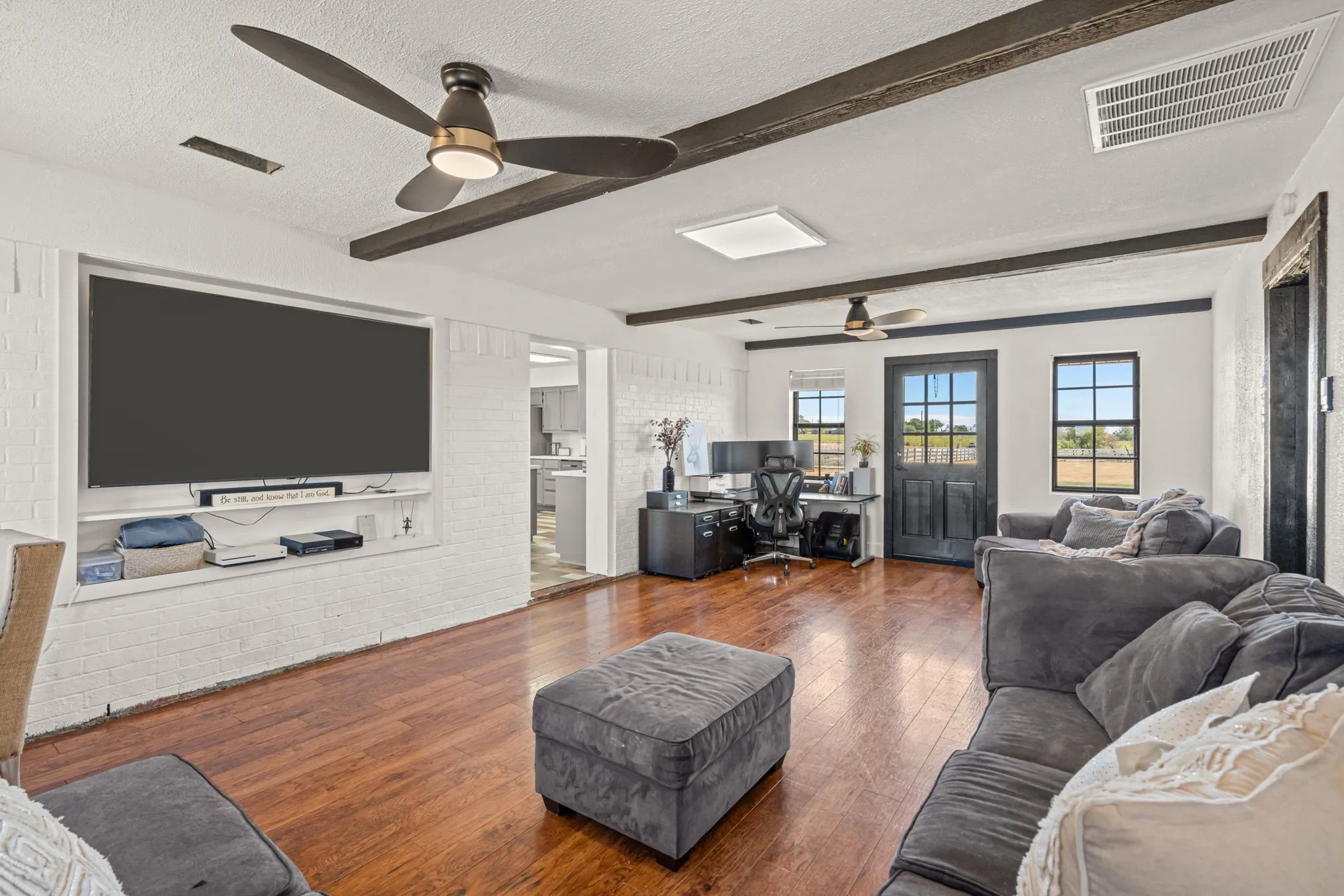 Extra bonus space between kitchen/dining and garage