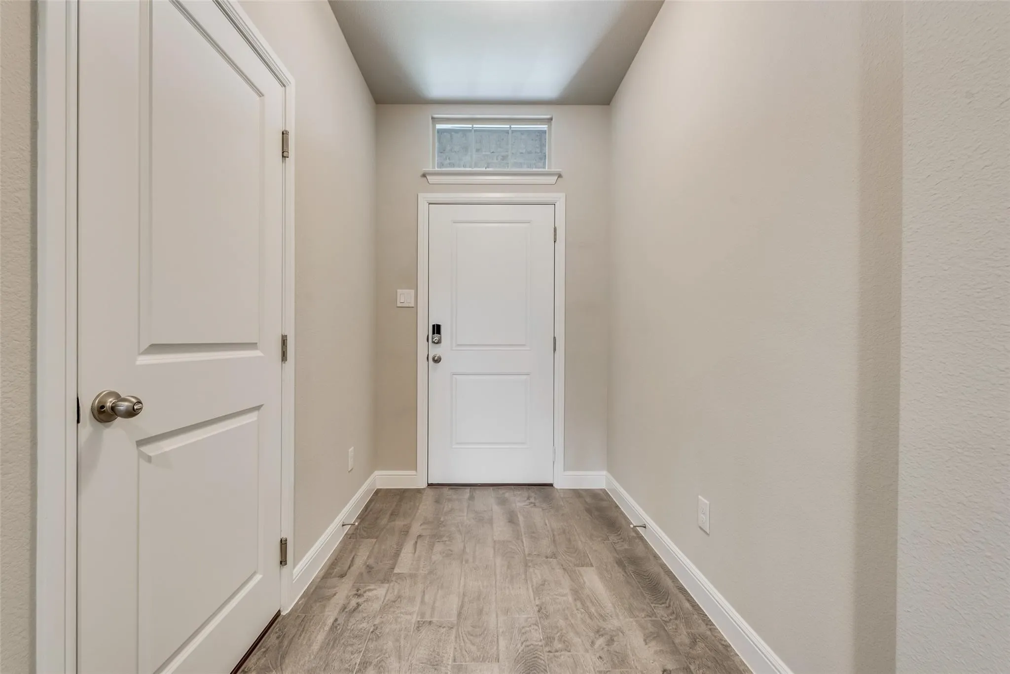 Doorway featuring light hardwood / wood-style floors
