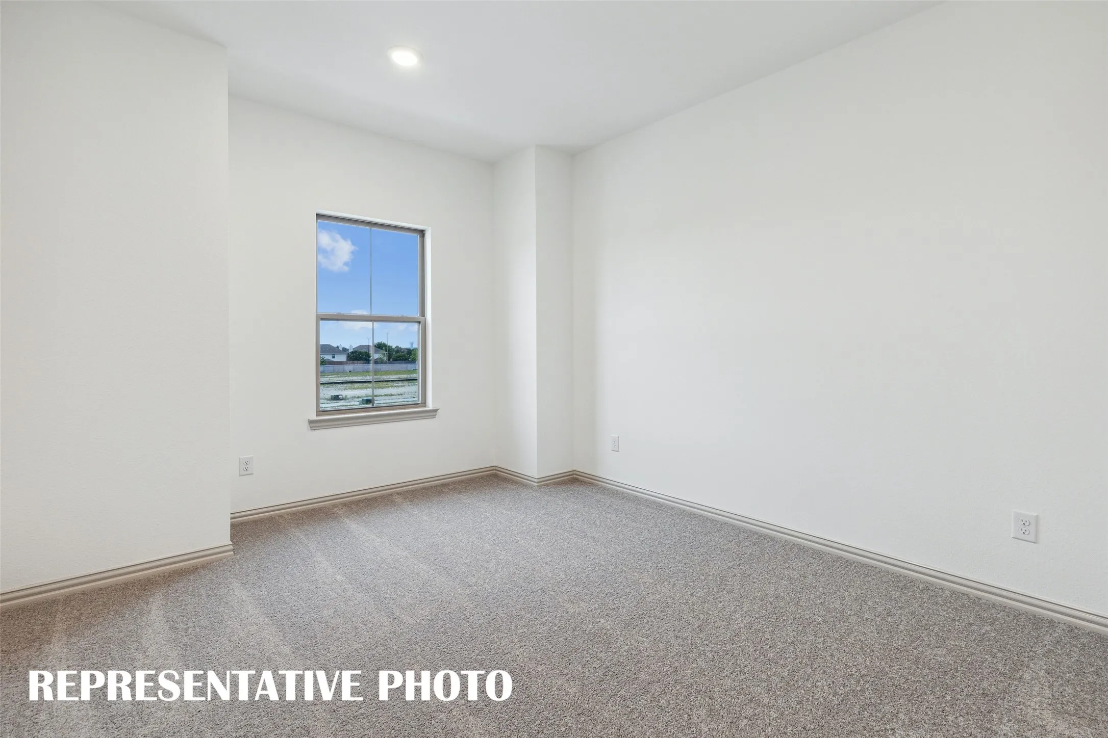 You'll find a nicely sized secondary bedroom in our Boyd floor plan.  REPRESENTATIVE PHOTO