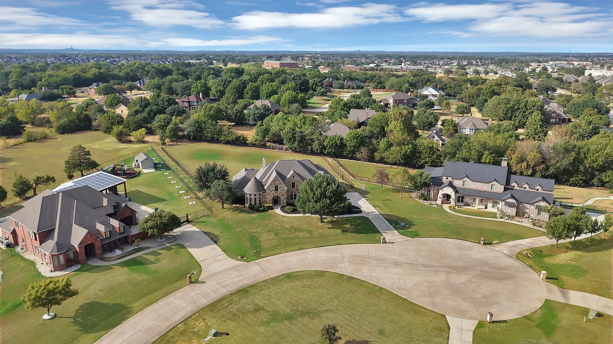 Expansive property featuring a large residence with a multi-gabled roof