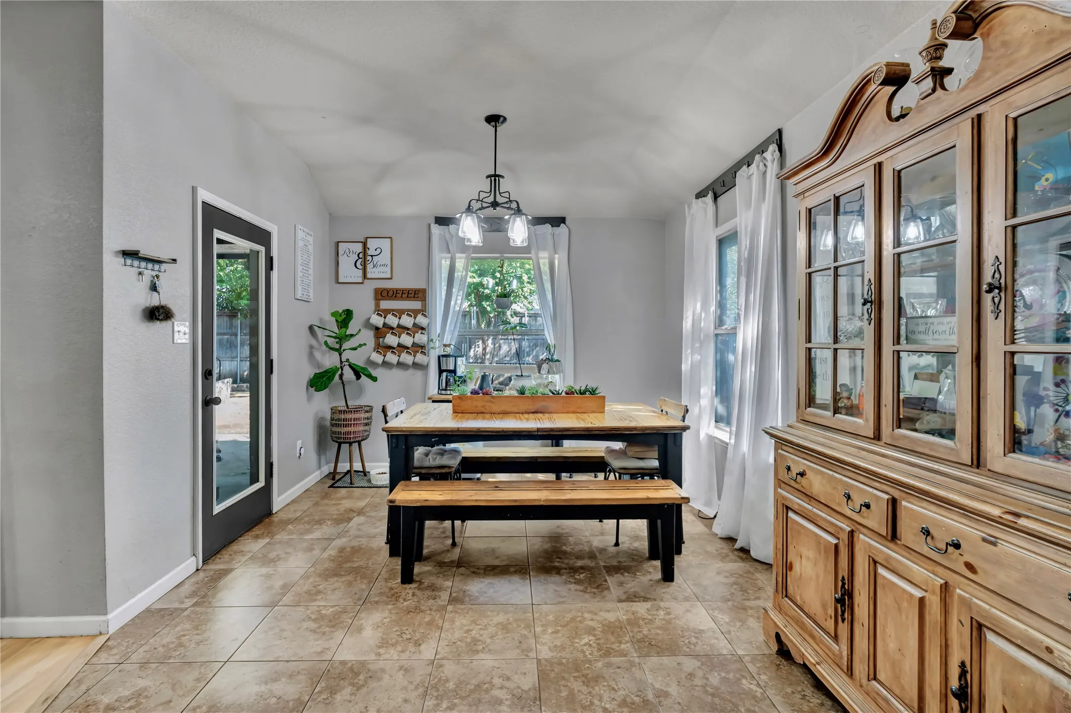 Tile flooring with a wood-finish transition