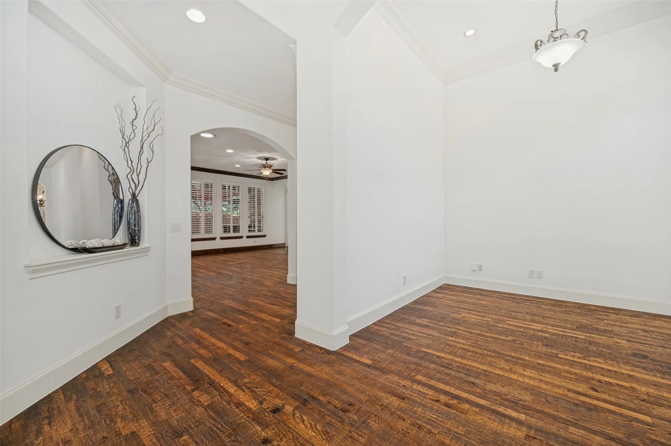 The entry is bright with tall ceilings. The imediate room to the right has been used as an office-sitting room.