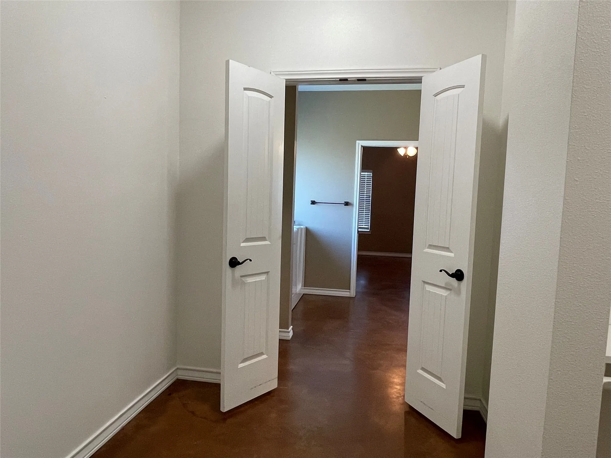 View from Closet into Primary Bath