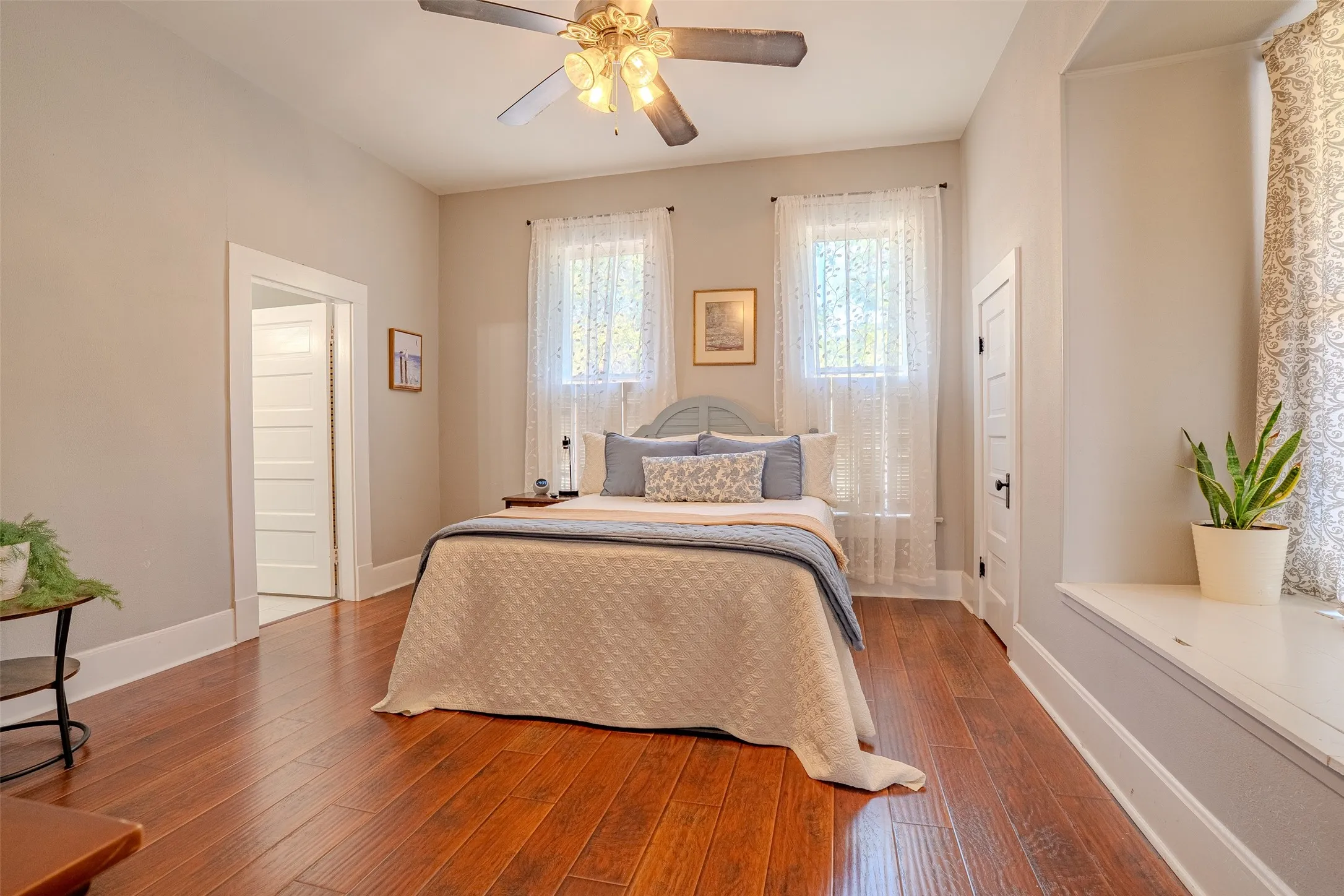 Laminate flooring with a ceiling fan light fixture