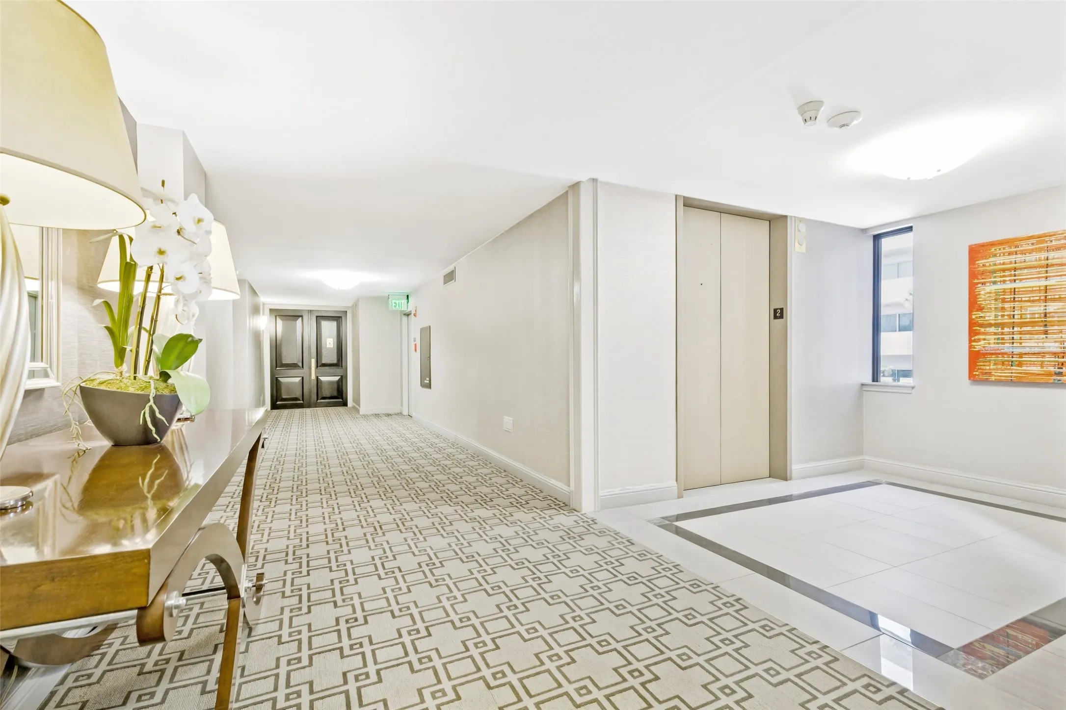 Elevator area and building hallway.