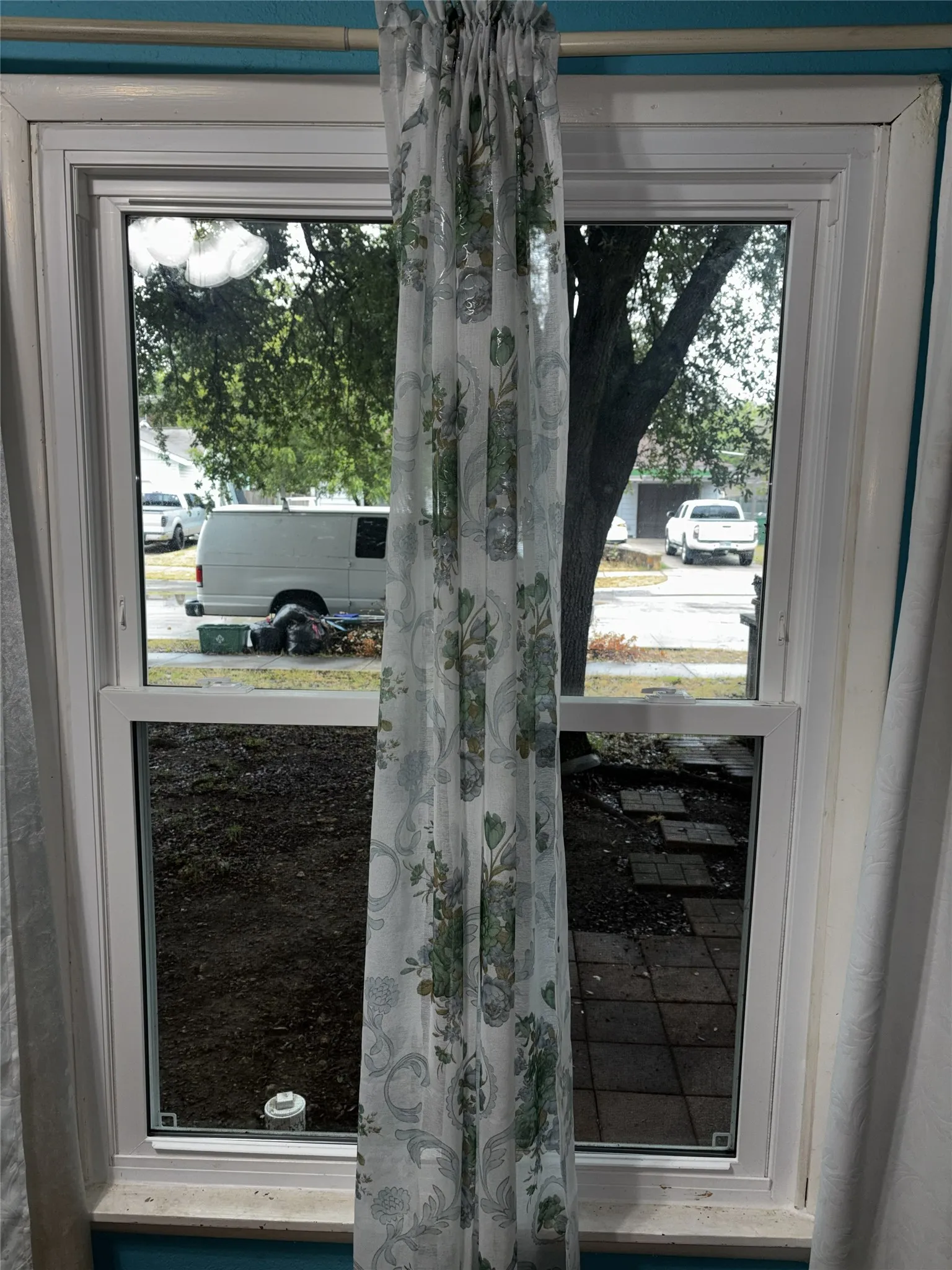 Double-hung window with white framing