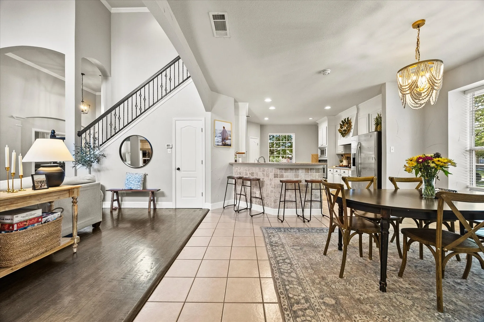 1602 Mapleleaf Drive Wylie, TX 75098 Two-story entry with wrought iron staircase and wood-finish flooring