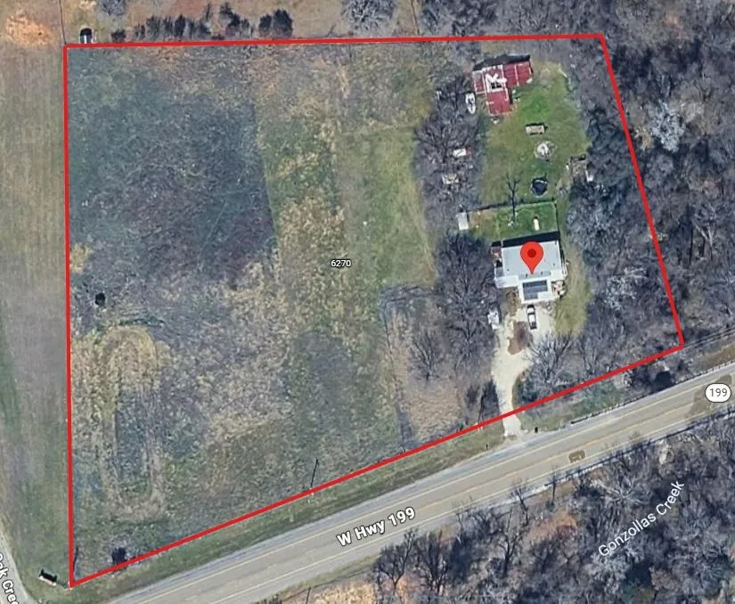 Aerial Site Plan. Outlining the property boundaries and surrounding geographical features