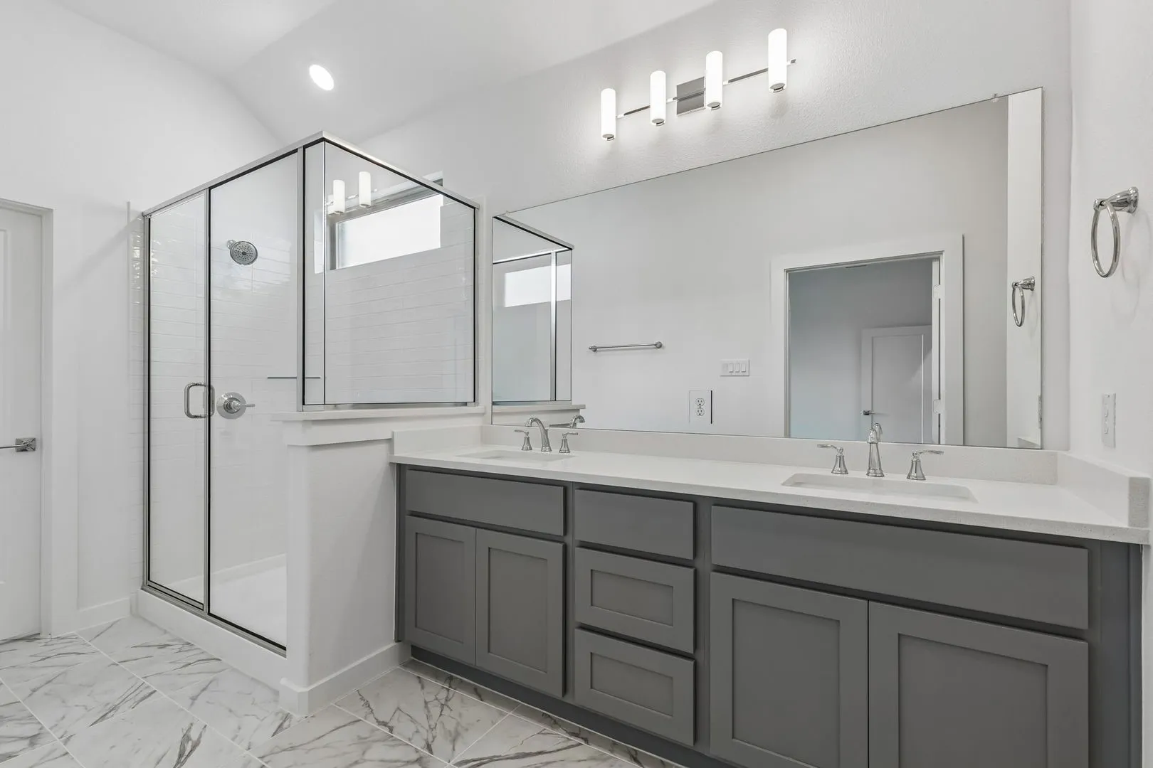 Primary Bathroom in the Claret home plan by Trophy Signature Homes – REPRESENTATIVE PHOTO