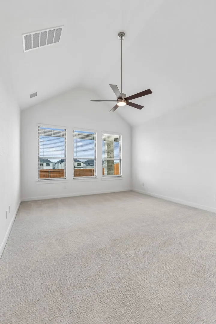 Primary Suite in the Claret home plan by Trophy Signature Homes – REPRESENTATIVE PHOTO