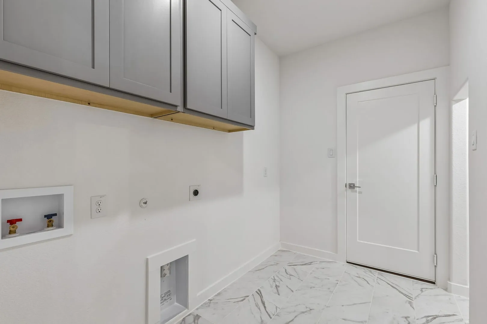 Utility Room in the Claret home plan by Trophy Signature Homes – REPRESENTATIVE PHOTO