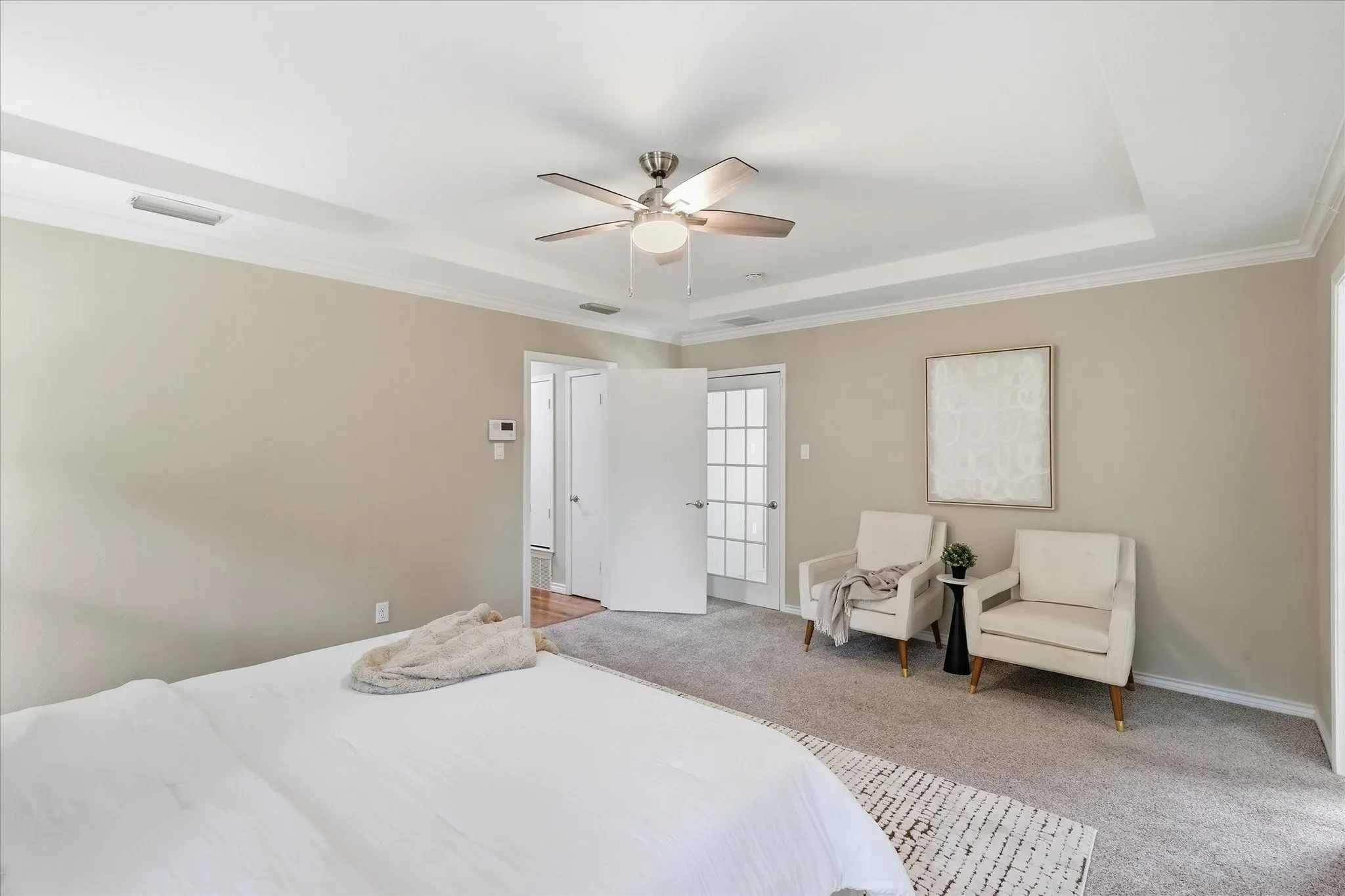 Huge Primary Bedroom with Door leading to Sunroom