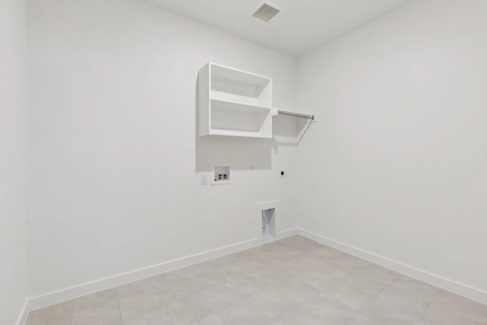 Utility in the Heisman home plan by Trophy Signature Homes – REPRESENTATIVE PHOTO