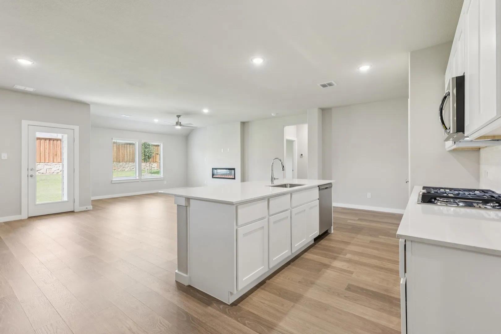 Open Floorplan in the Heisman home plan by Trophy Signature Homes – REPRESENTATIVE PHOTO