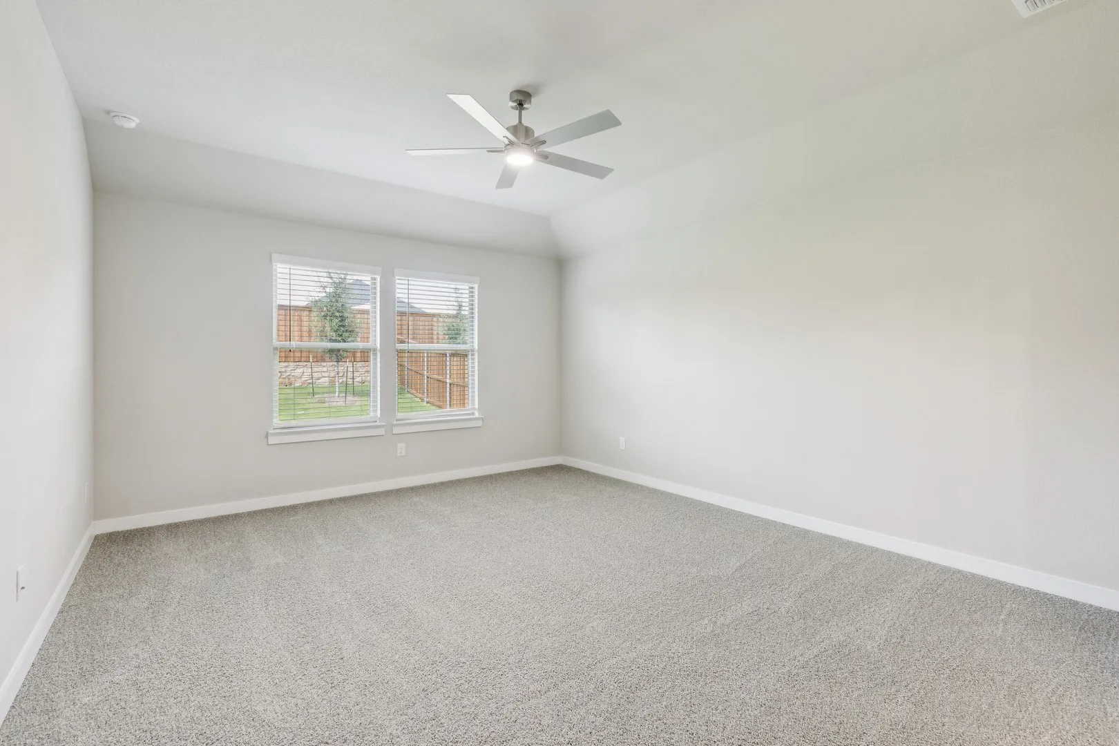 Primary Suite in the Heisman home plan by Trophy Signature Homes – REPRESENTATIVE PHOTO