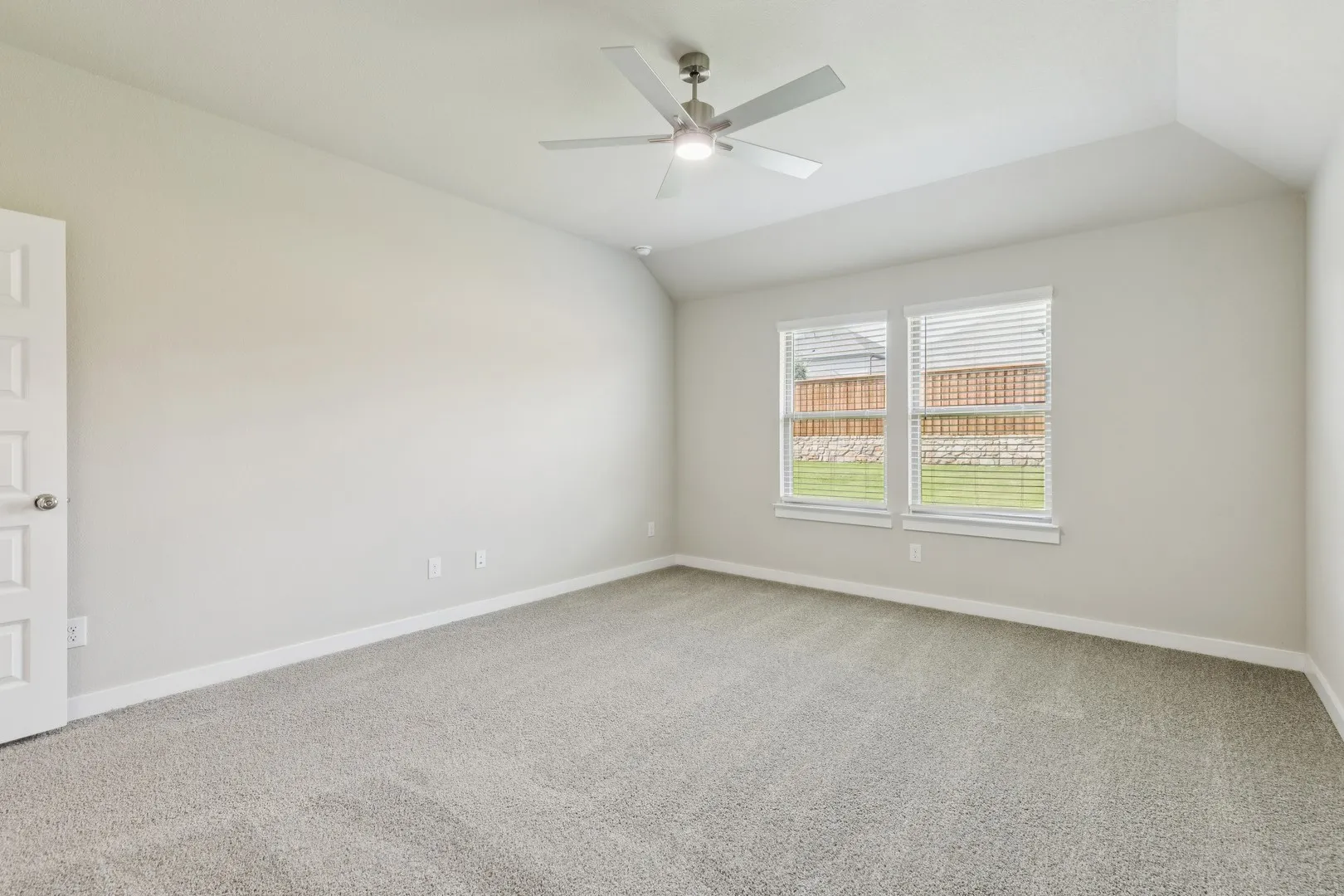 Primary Suite in the Heisman home plan by Trophy Signature Homes – REPRESENTATIVE PHOTO