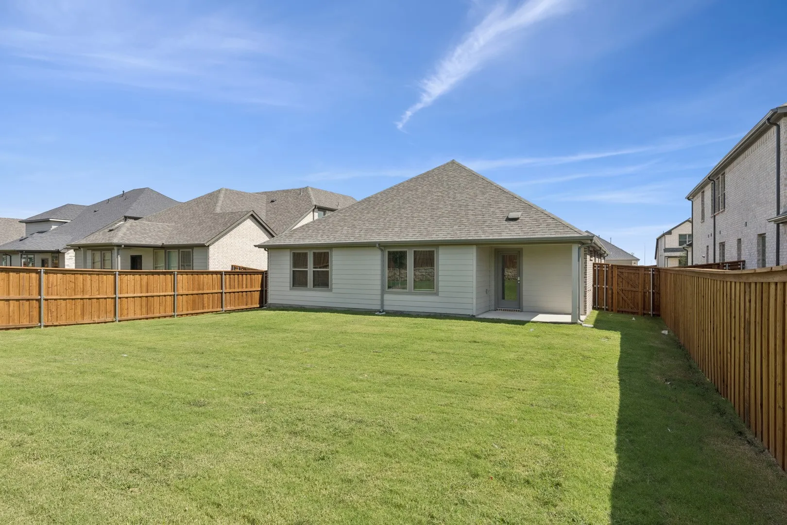 Covered Patio in the Heisman home plan by Trophy Signature Homes – REPRESENTATIVE PHOTO