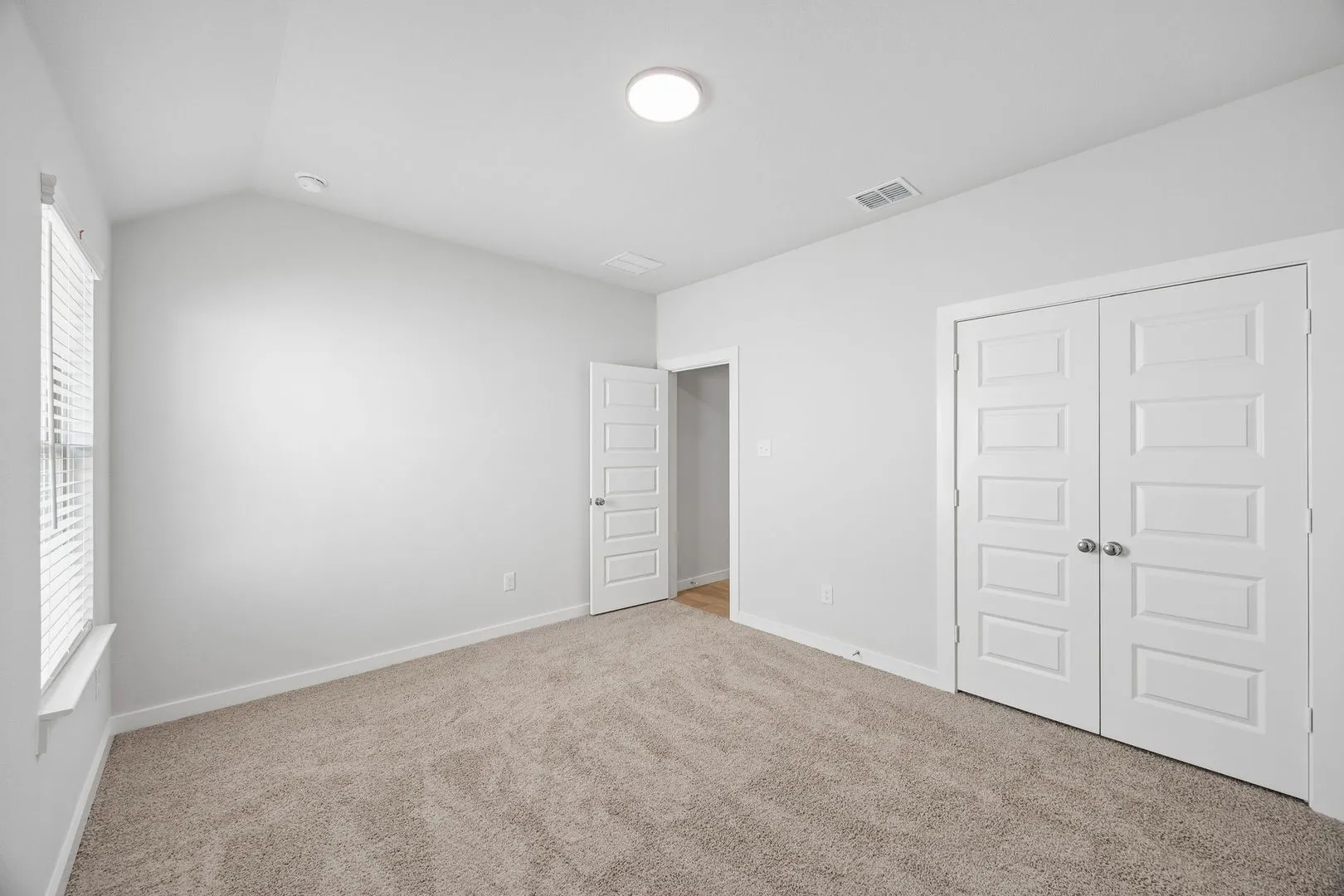 Primary Suite in the Oscar home plan by Trophy Signature Homes – REPRESENTATIVE PHOTO
