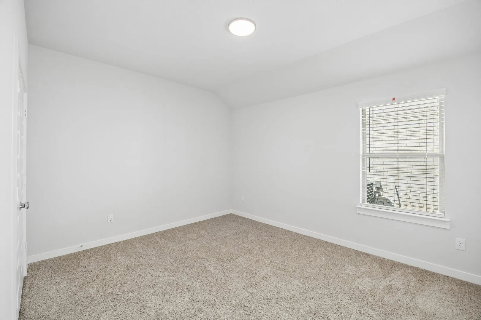 Bedroom in the Oscar home plan by Trophy Signature Homes – REPRESENTATIVE PHOTO
