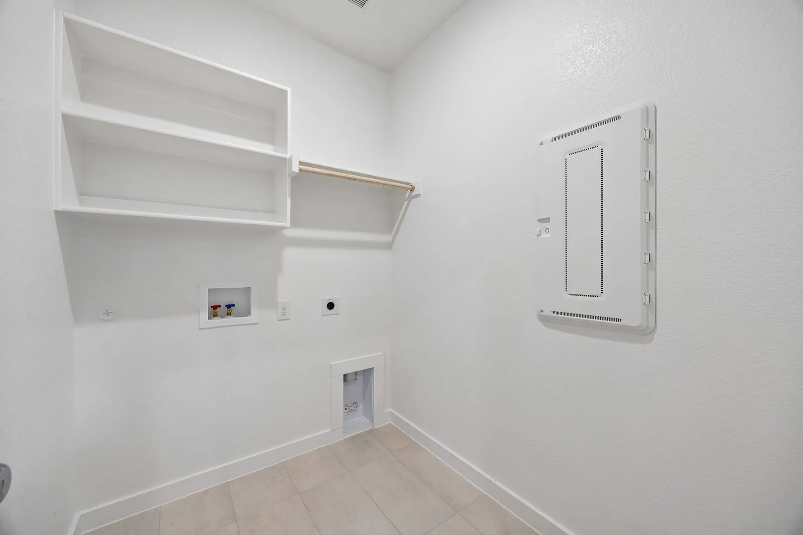 Utility Room in the Oscar home plan by Trophy Signature Homes – REPRESENTATIVE PHOTO
