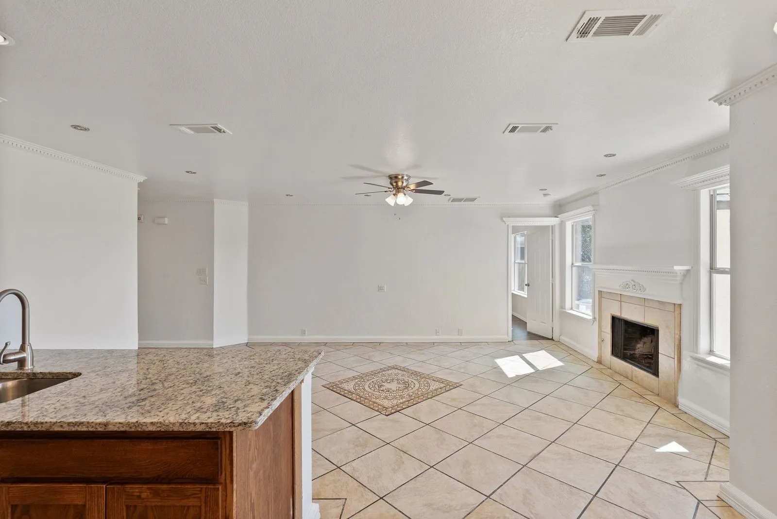 Kitchen island with granite countertop and undermount sink