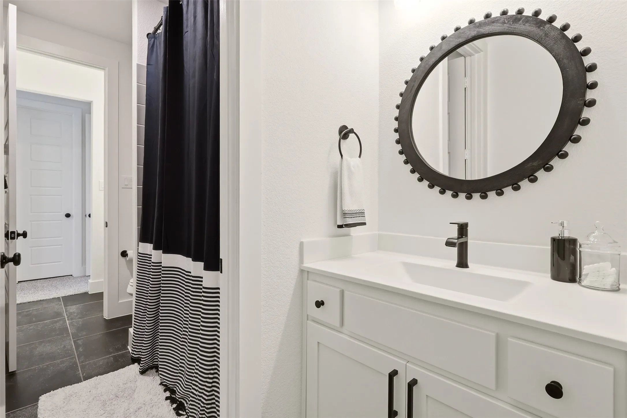 Jack and Jill bathroom off guest wing. Perfection for multigeneration living.