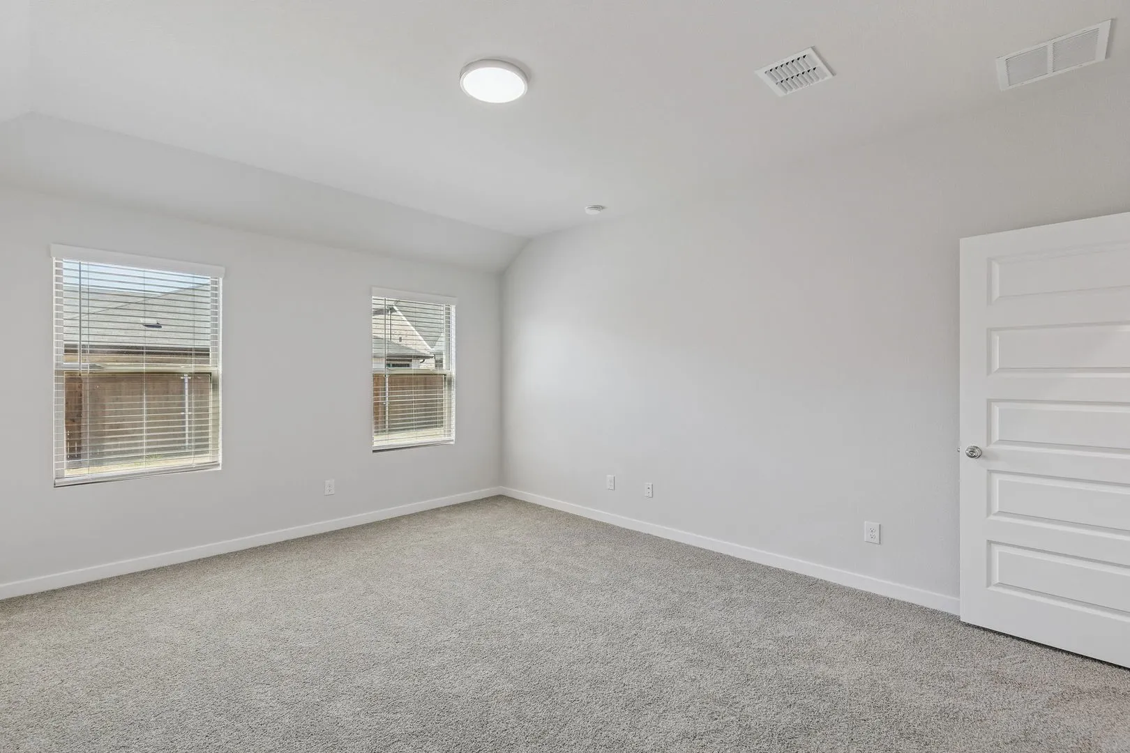 Primary Suite in the Harrison home plan by Trophy Signature Homes – REPRESENTATIVE PHOTO